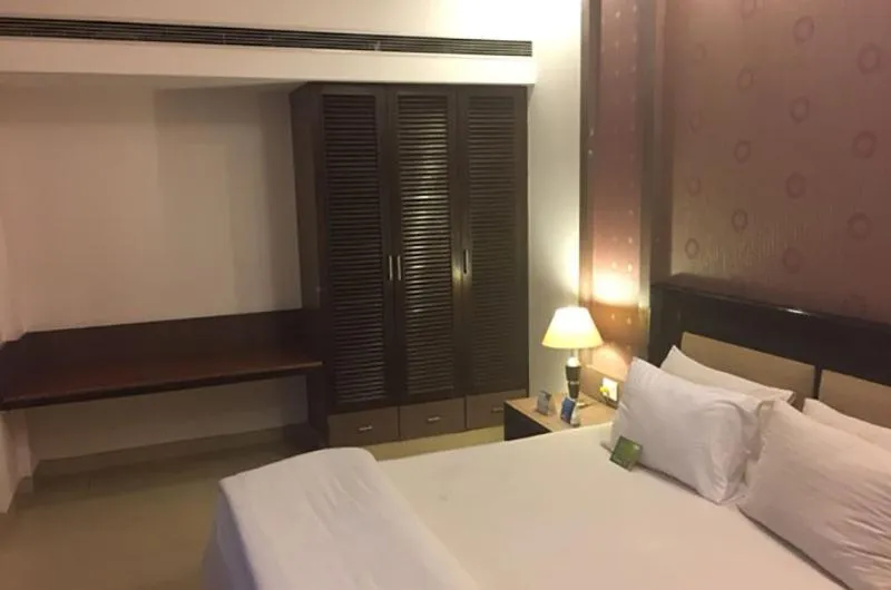 Bed in Shiva Oasis Resort