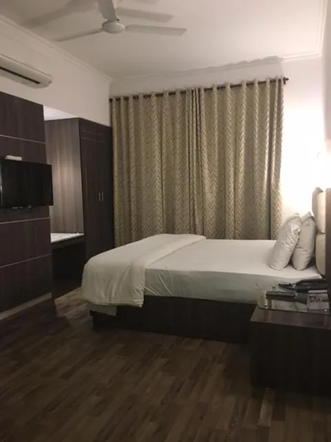 Bed in Shiva Oasis Resort