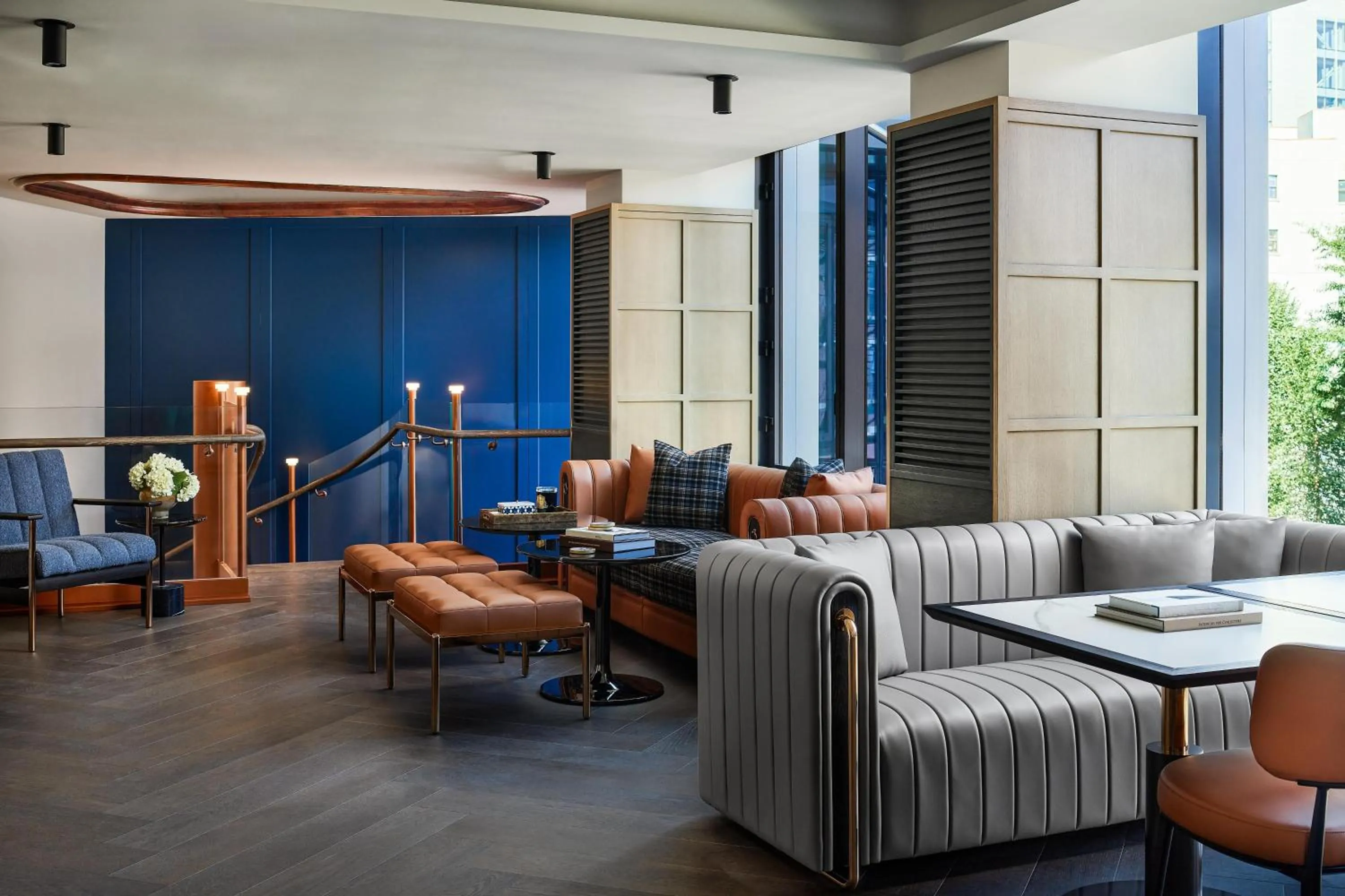 Communal lounge/ TV room in The George Manhattan, Tapestry Collection By Hilton