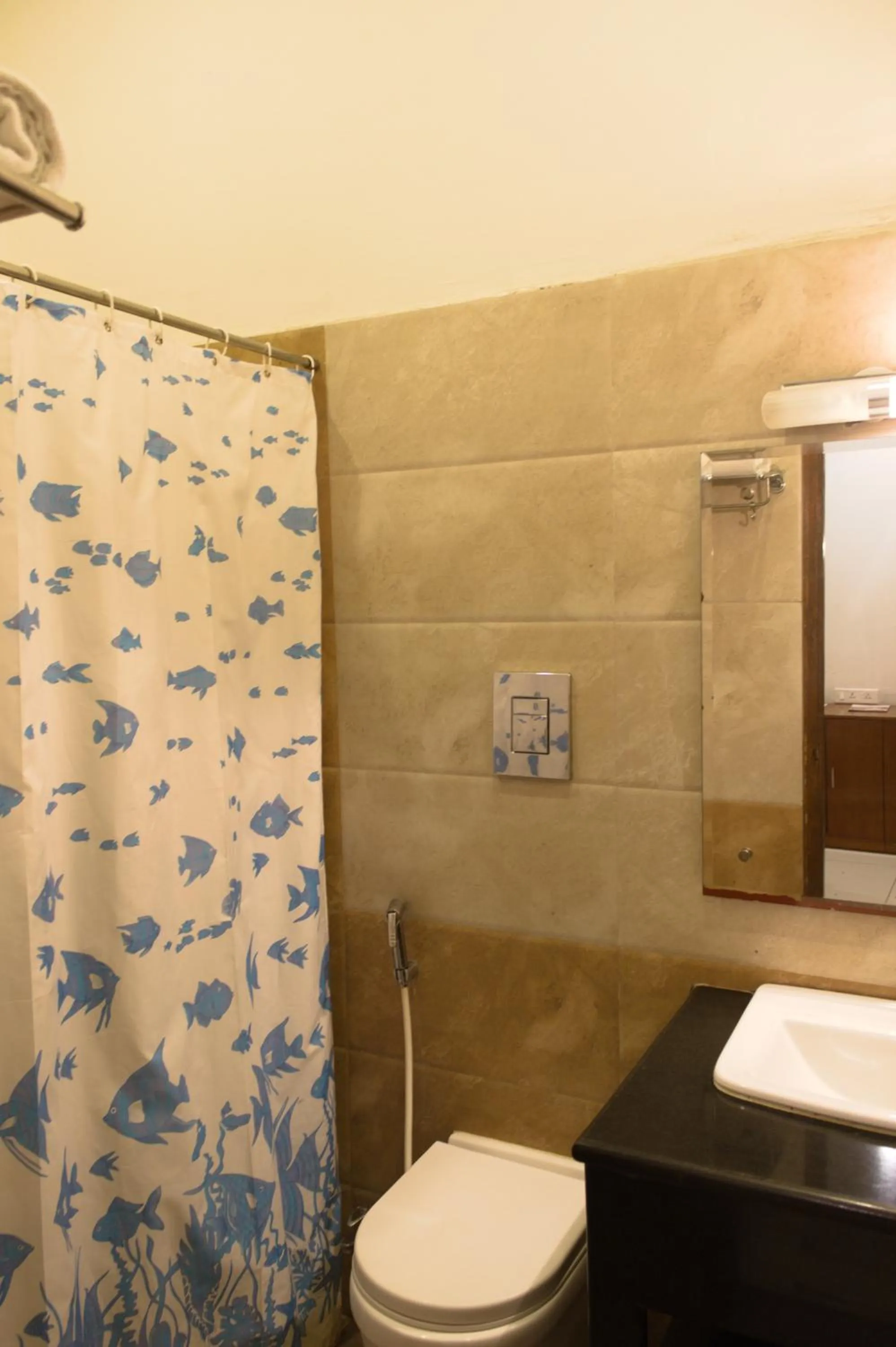 Bathroom in Mrugavani Resort & Spa