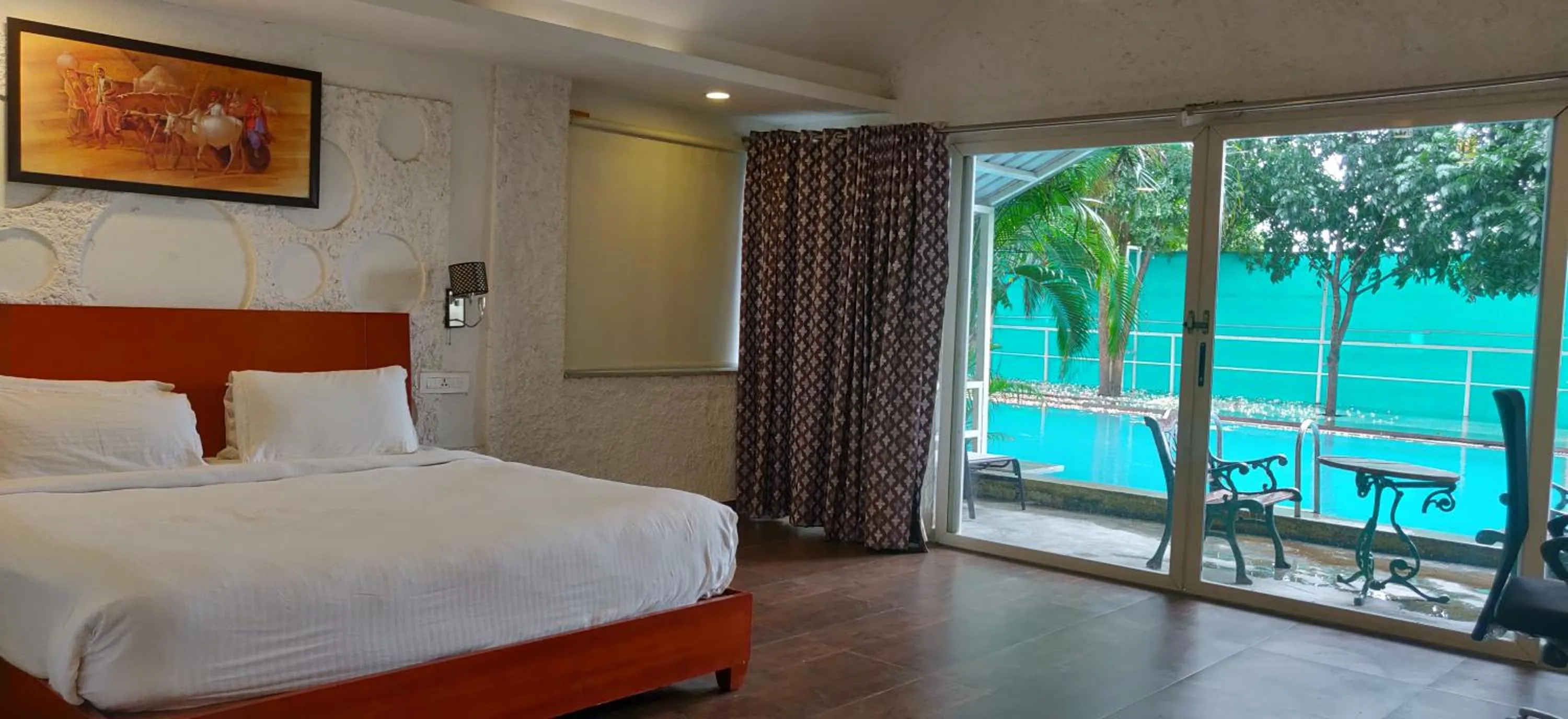 Pool view, Bed in Mrugavani Resort & Spa