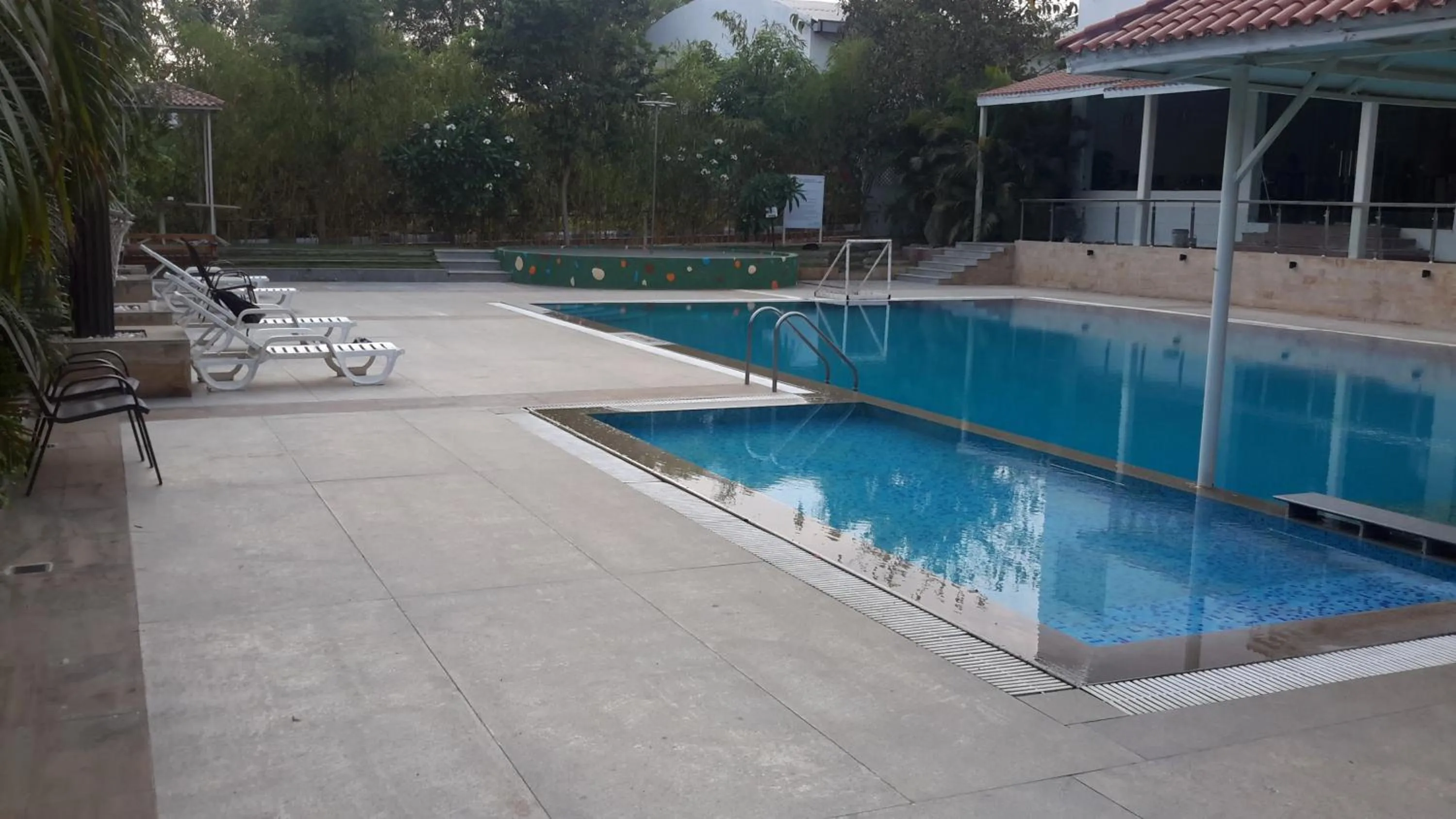 Swimming pool in Mrugavani Resort & Spa