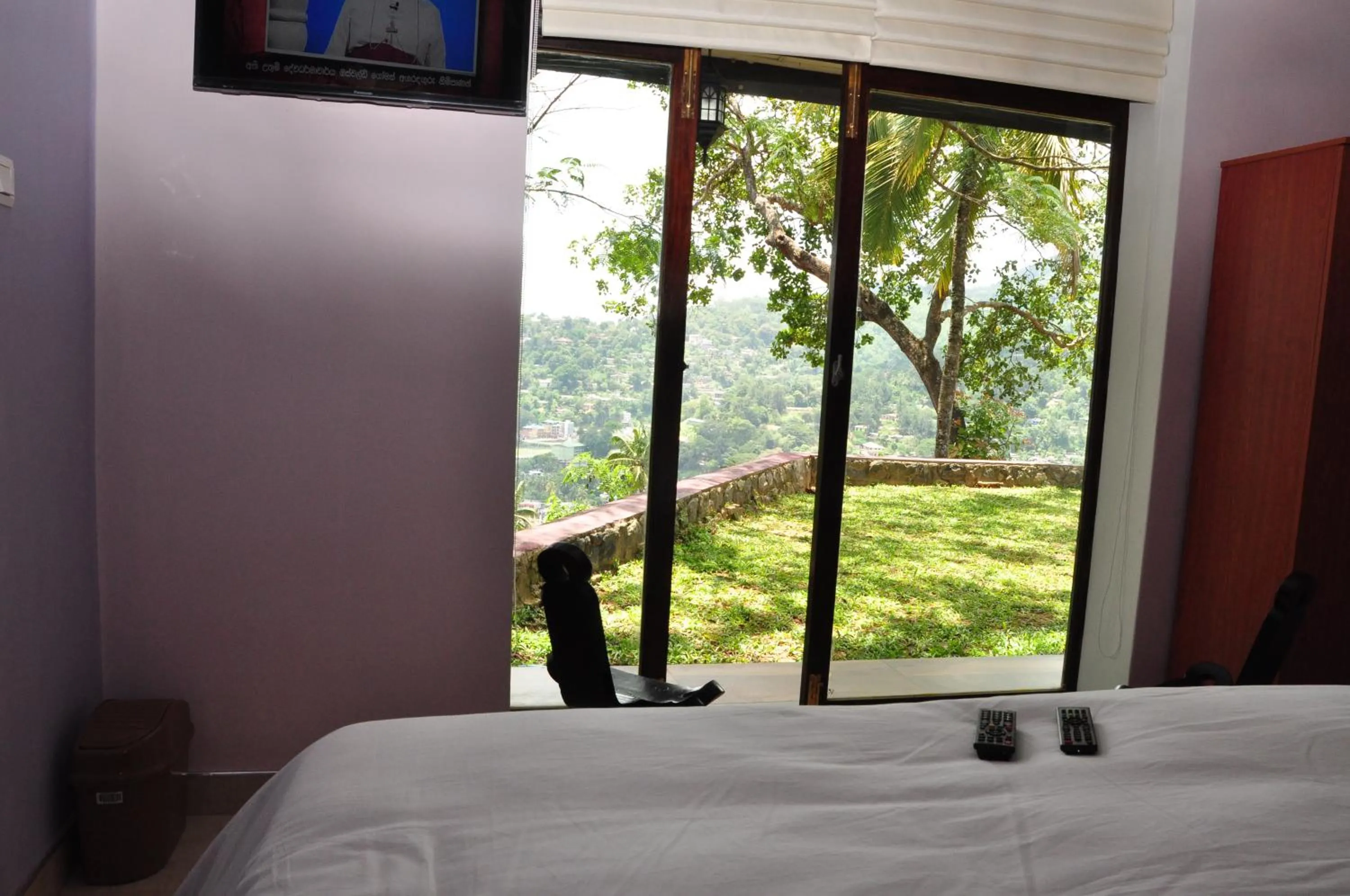 Garden view, Bed in The Buena Vista Kandy