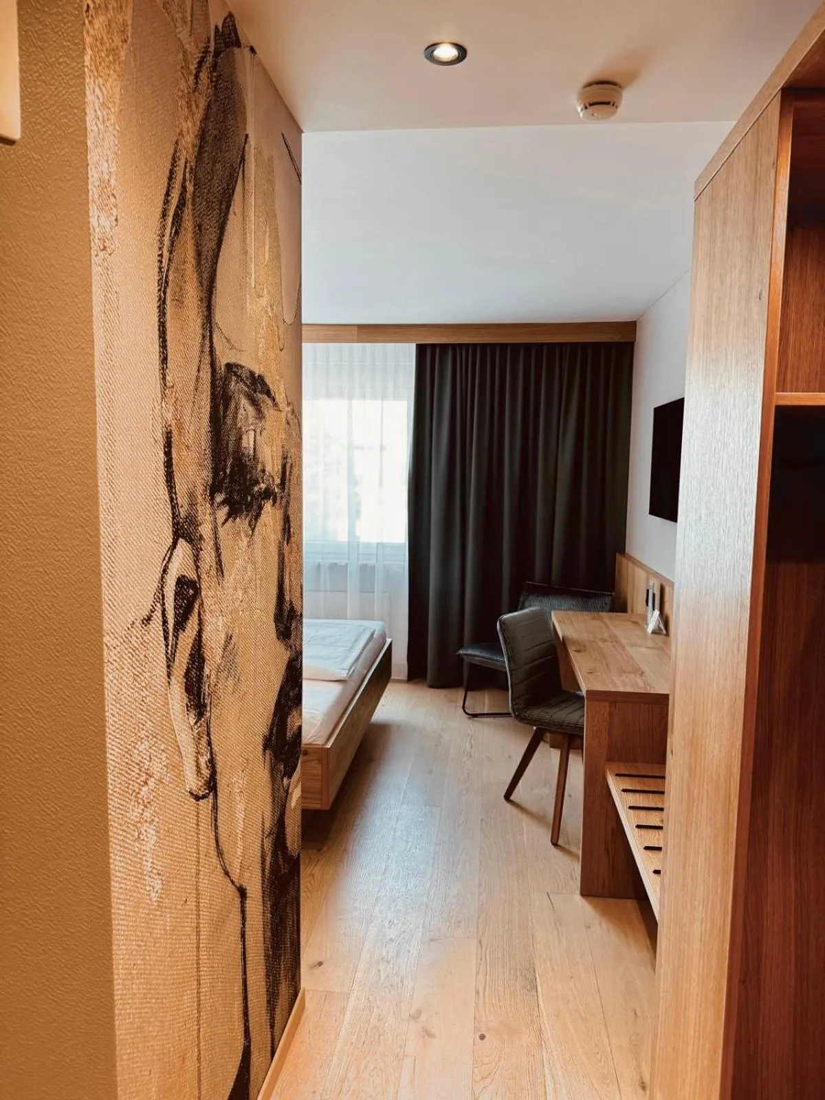 Living room, Bed in Hotel Krone