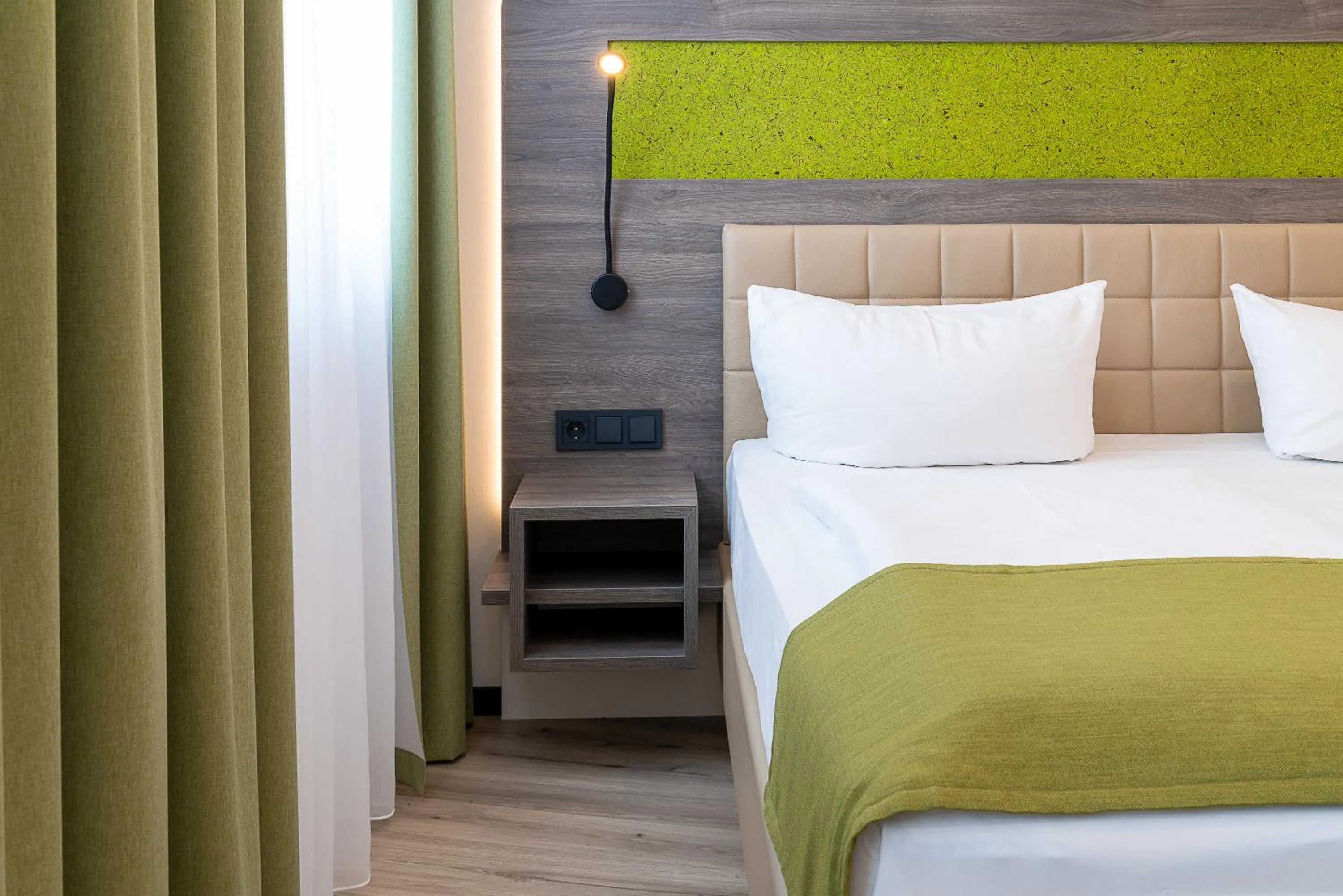 Bed in CHRIZZ Rooms