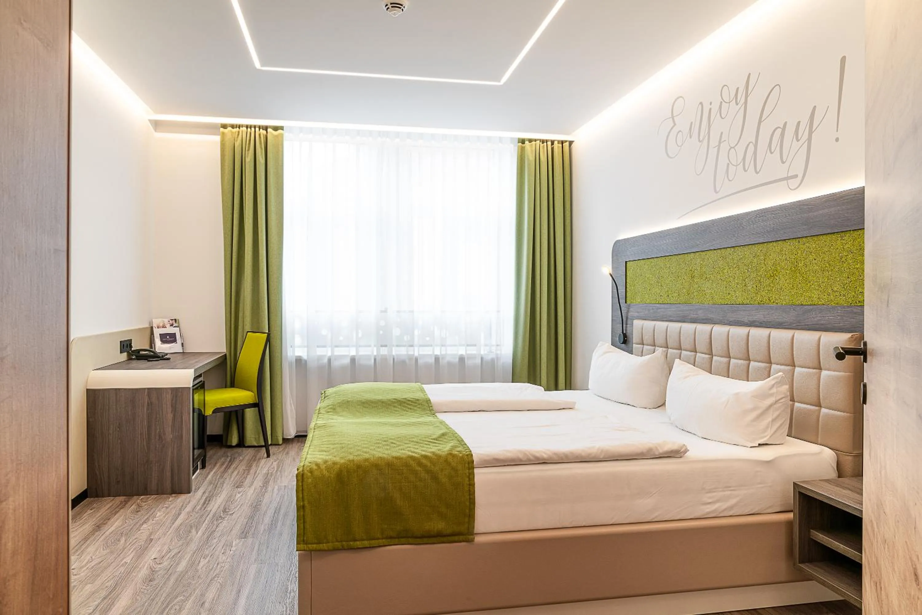 Bed in CHRIZZ Rooms