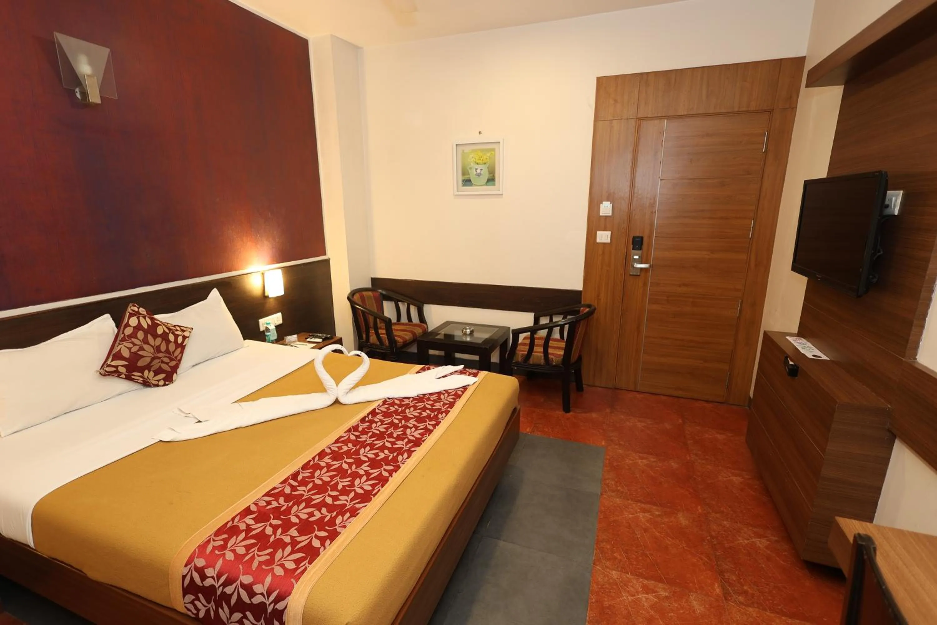 Bed in Abirami Residency