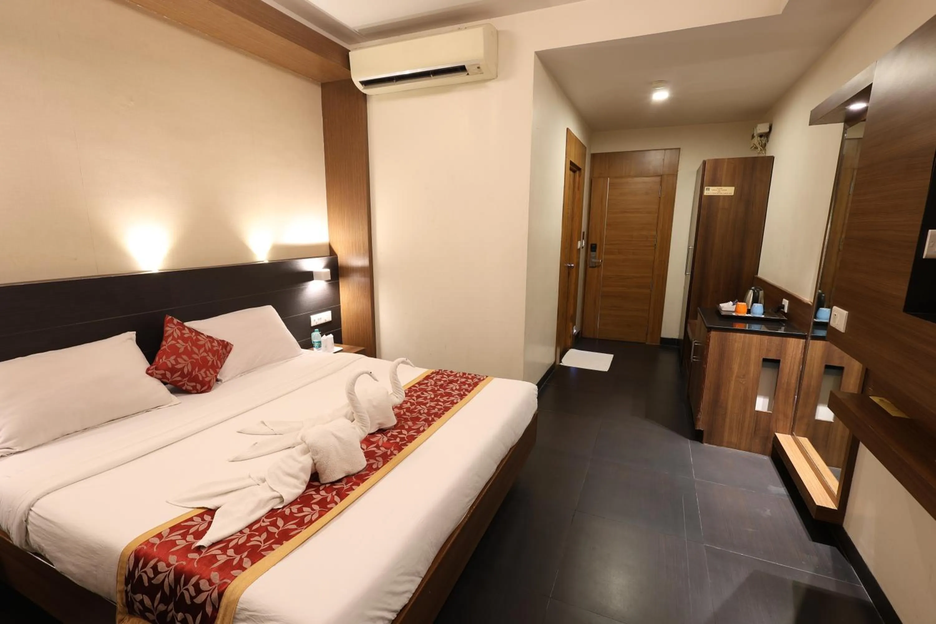 Bed in Abirami Residency