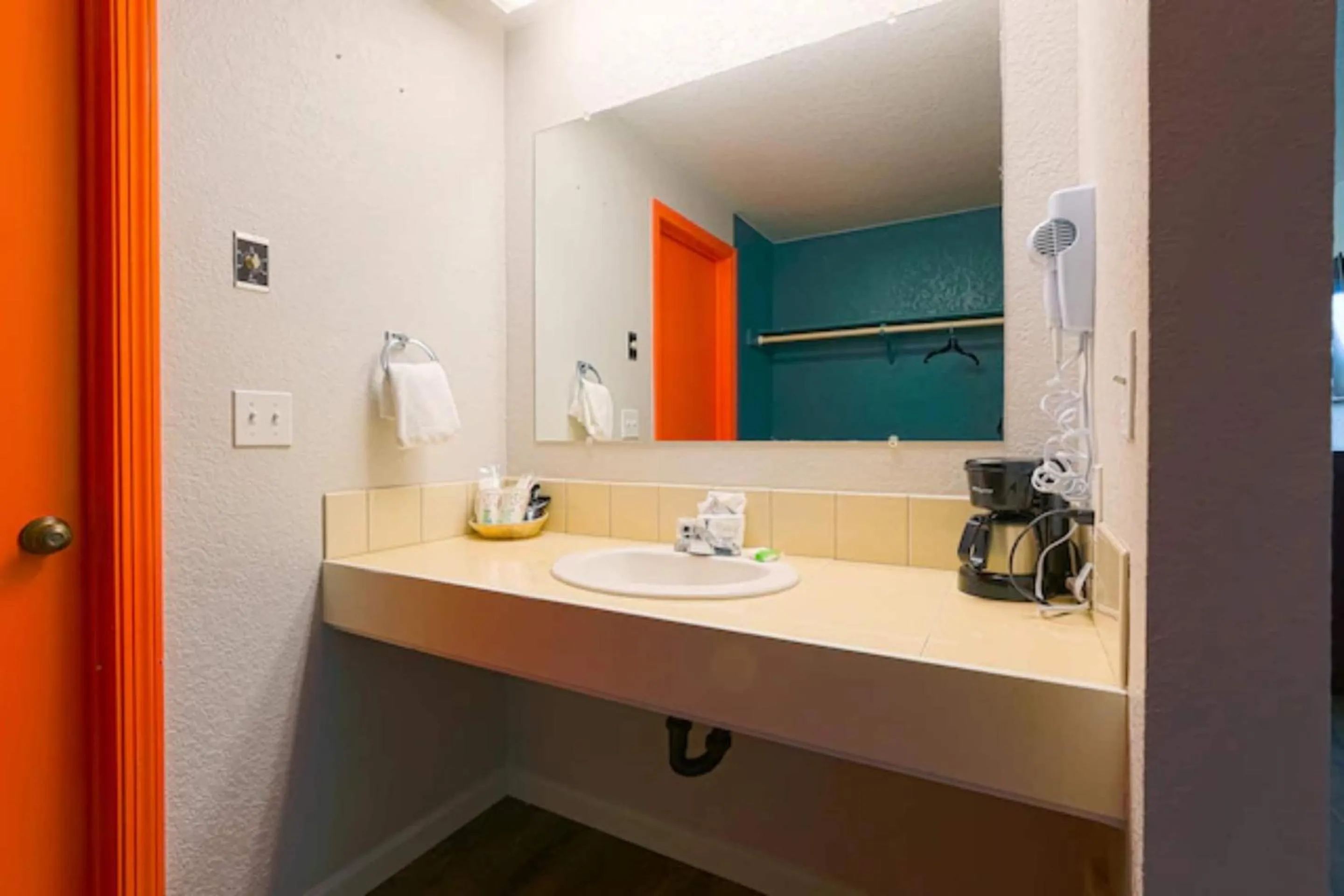 Bathroom in Coast River Inn by OYO Seaside