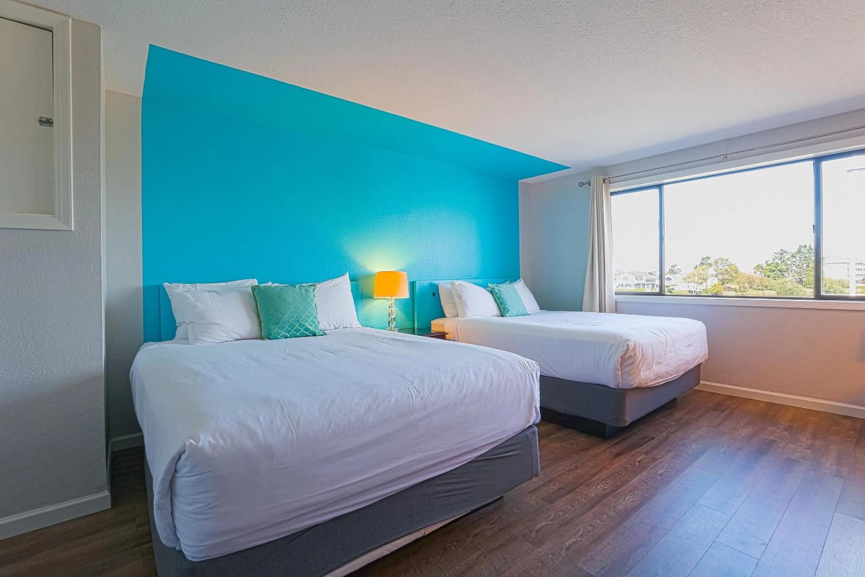 Bedroom, Bed in Coast River Inn by OYO Seaside