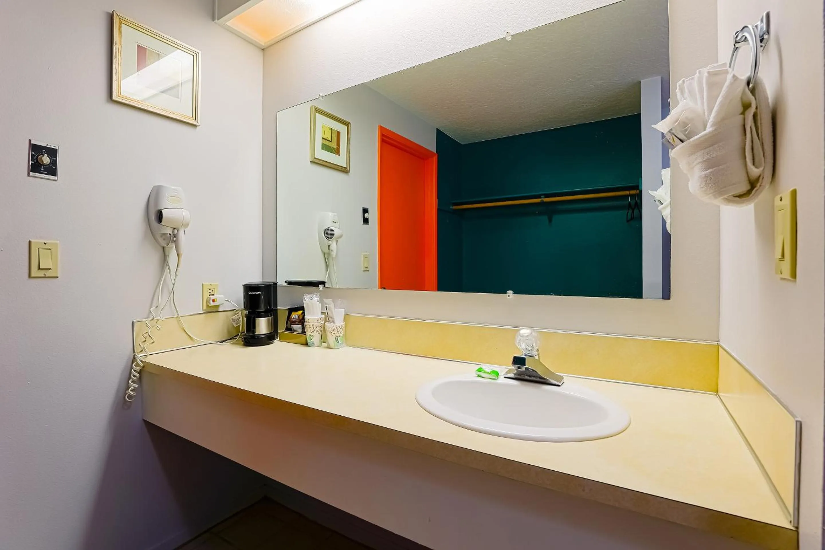 Bathroom in Coast River Inn by OYO Seaside