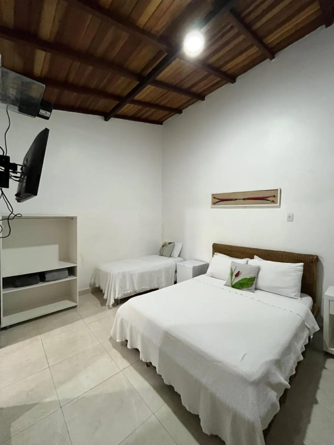 Bed in Pousada Praia e Conforto