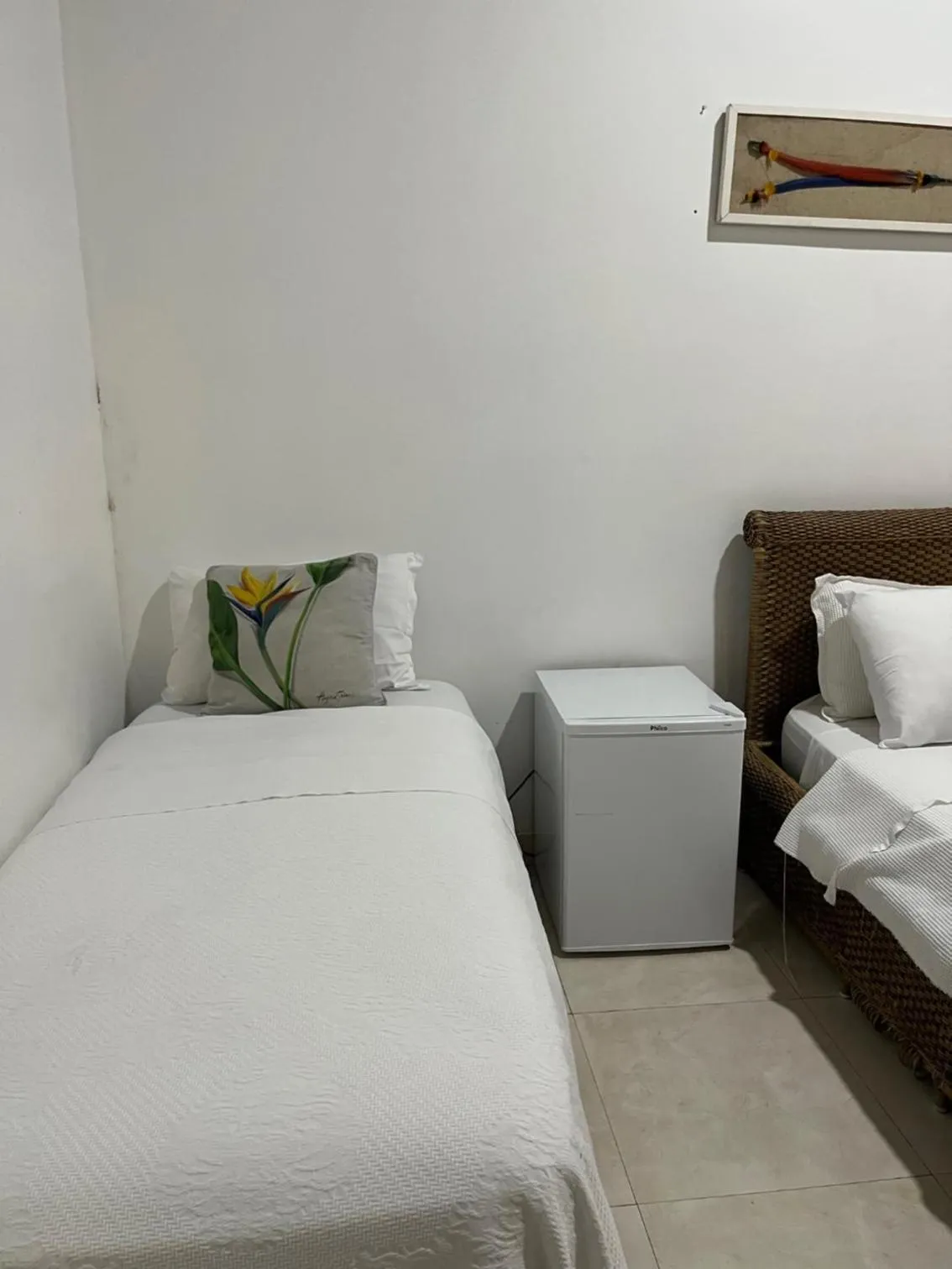 Bed in Pousada Praia e Conforto