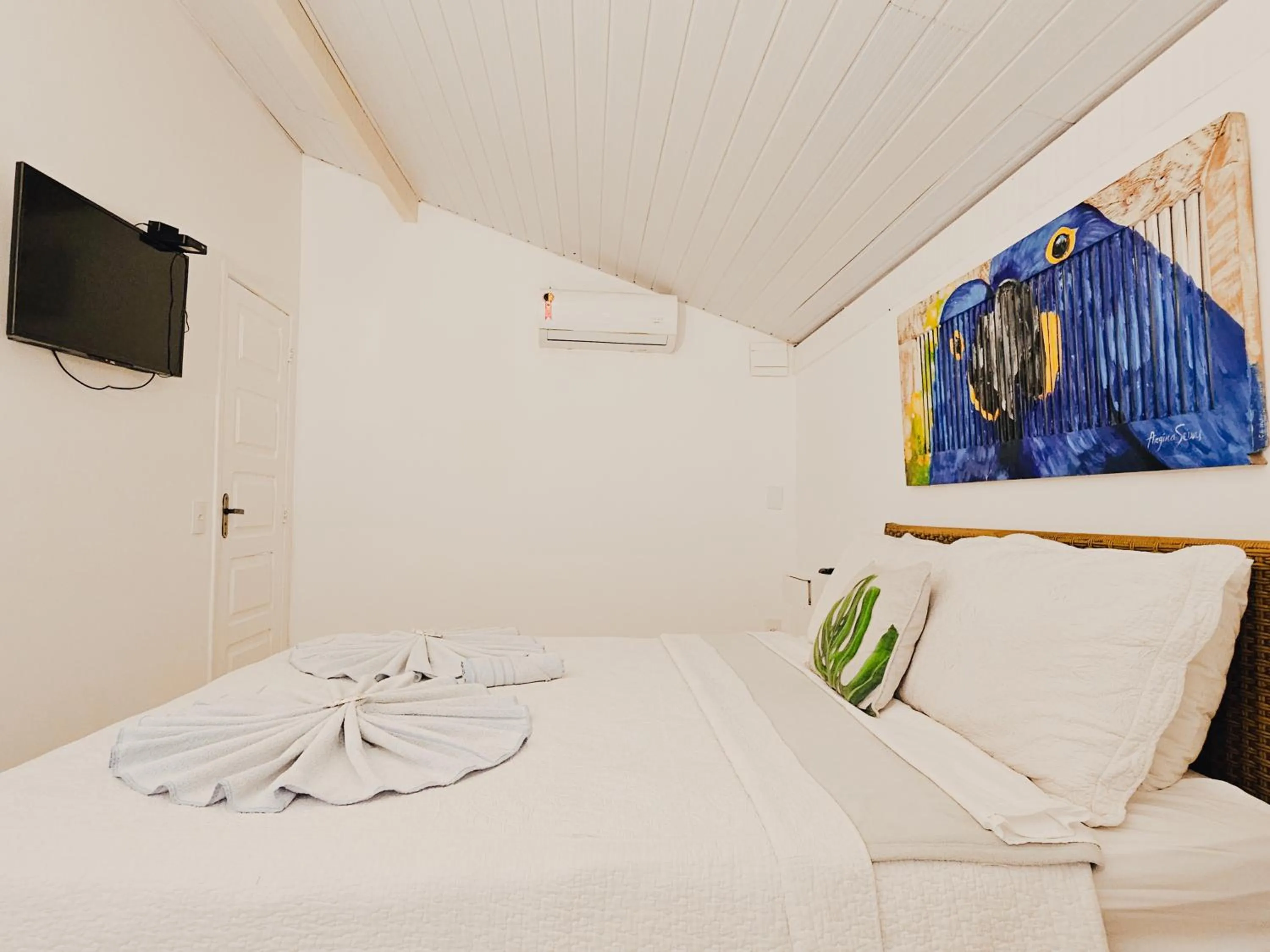 Bed in Pousada Praia e Conforto