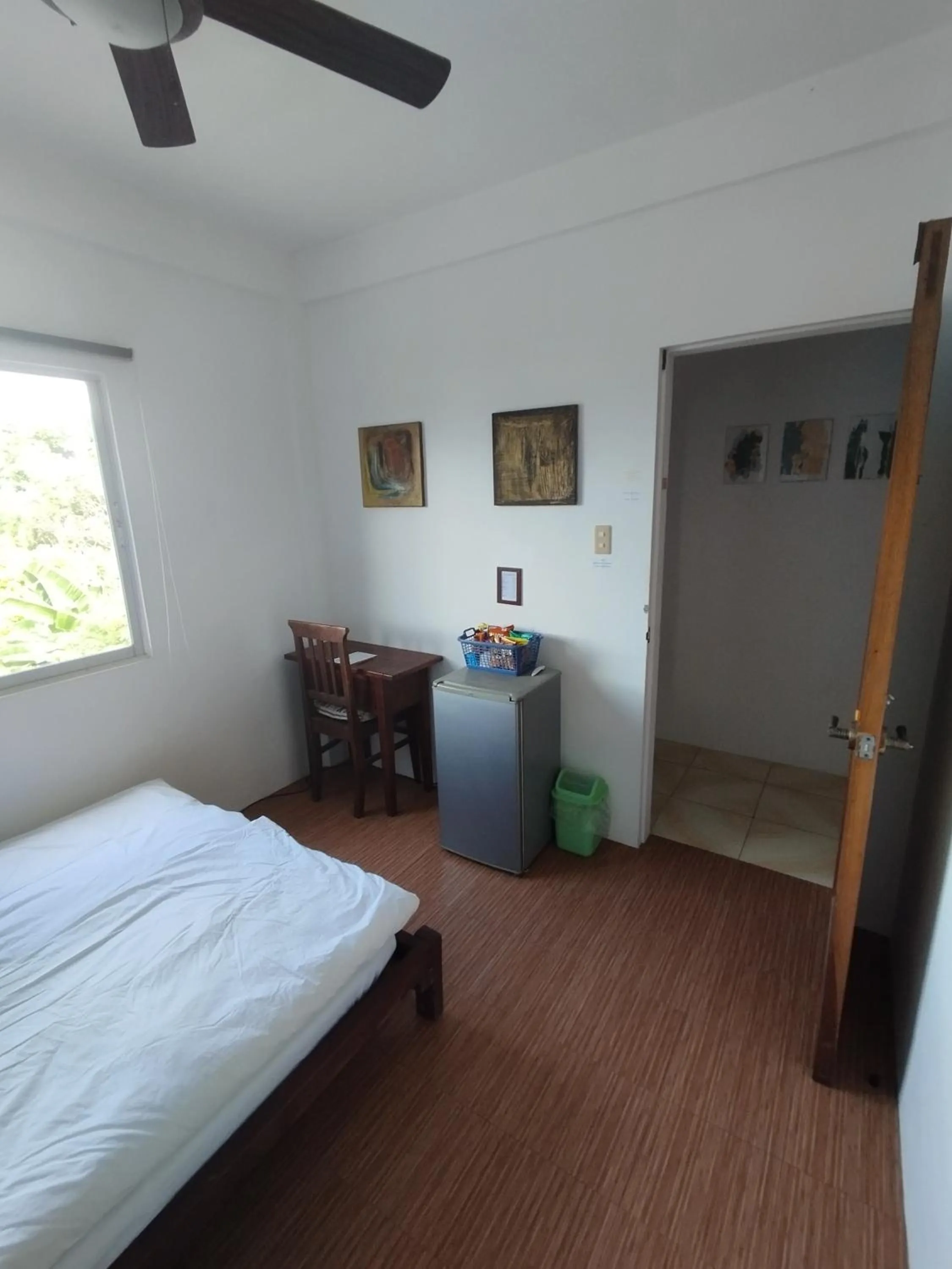 Bed in Roger's Place Guesthouse