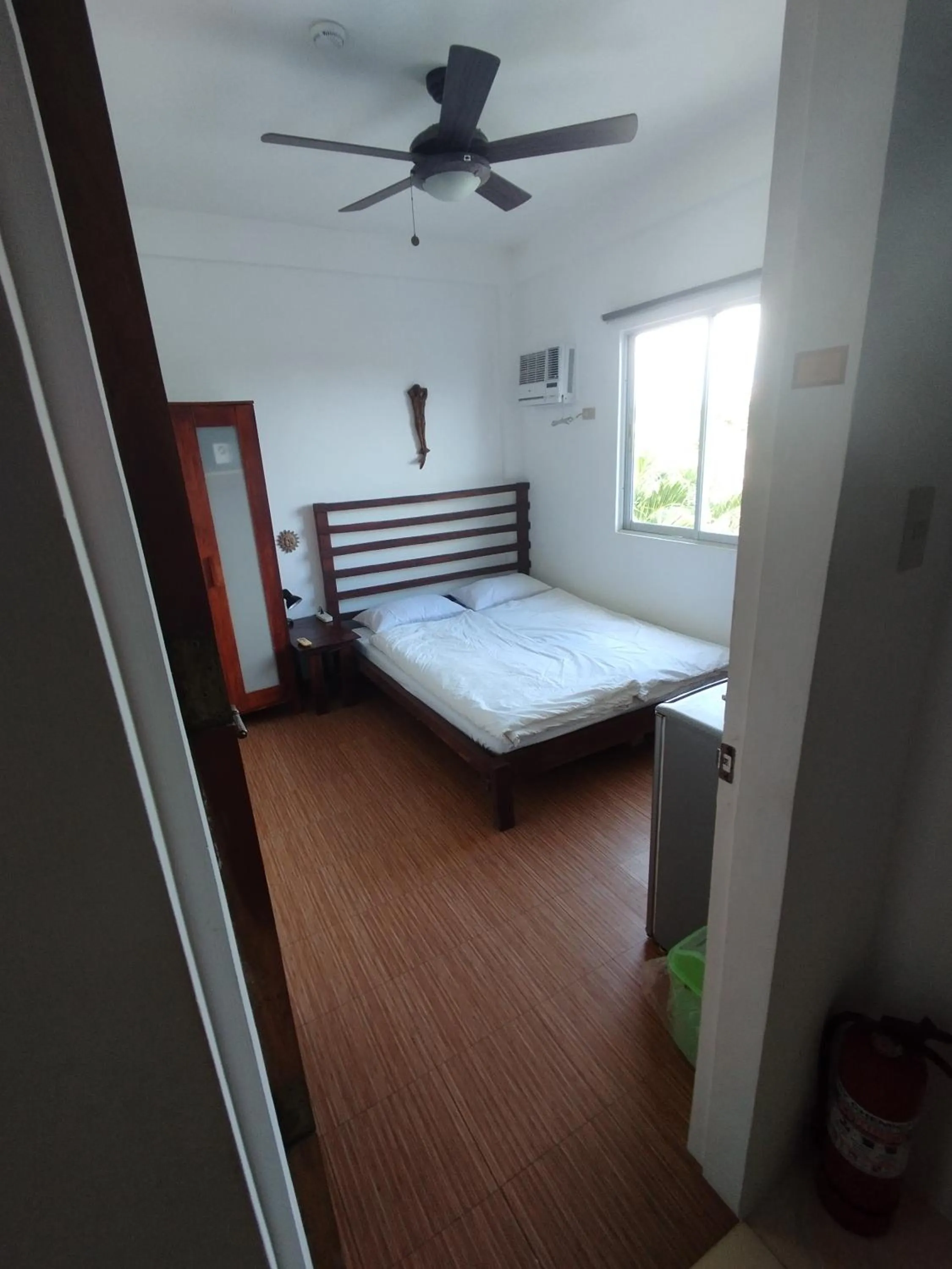 Bed in Roger's Place Guesthouse