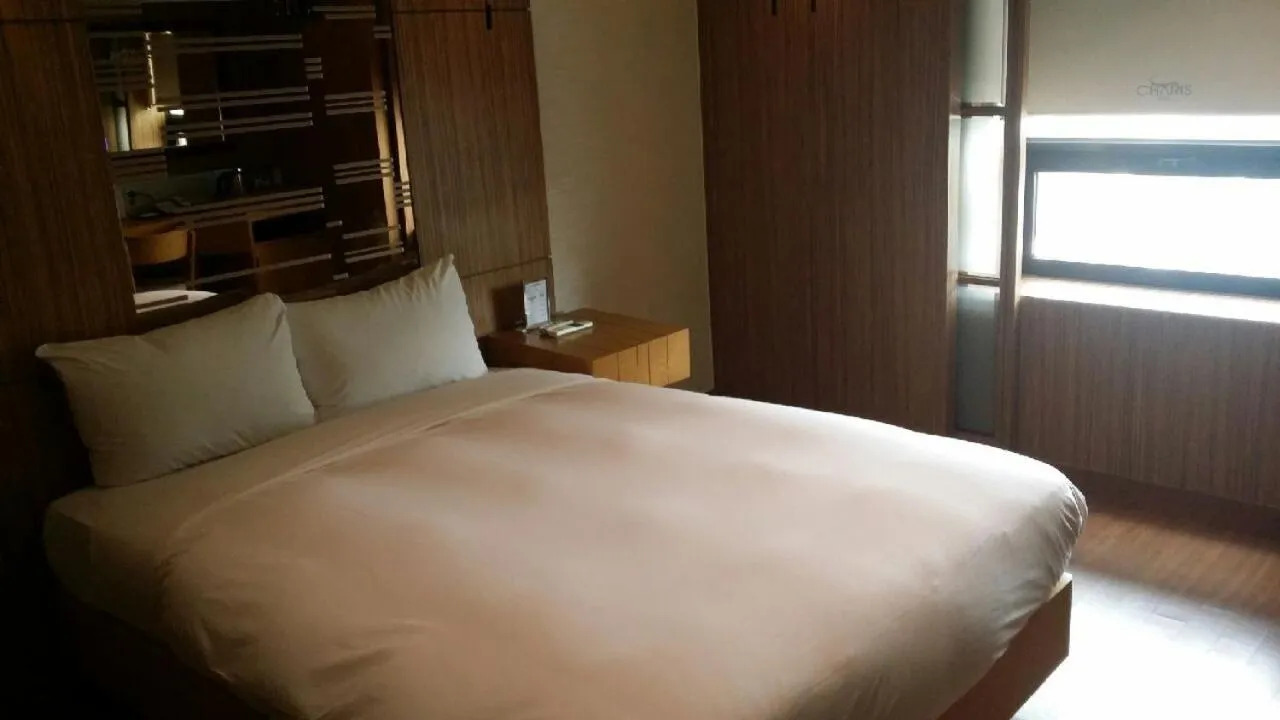 Bed in Charis Hotel