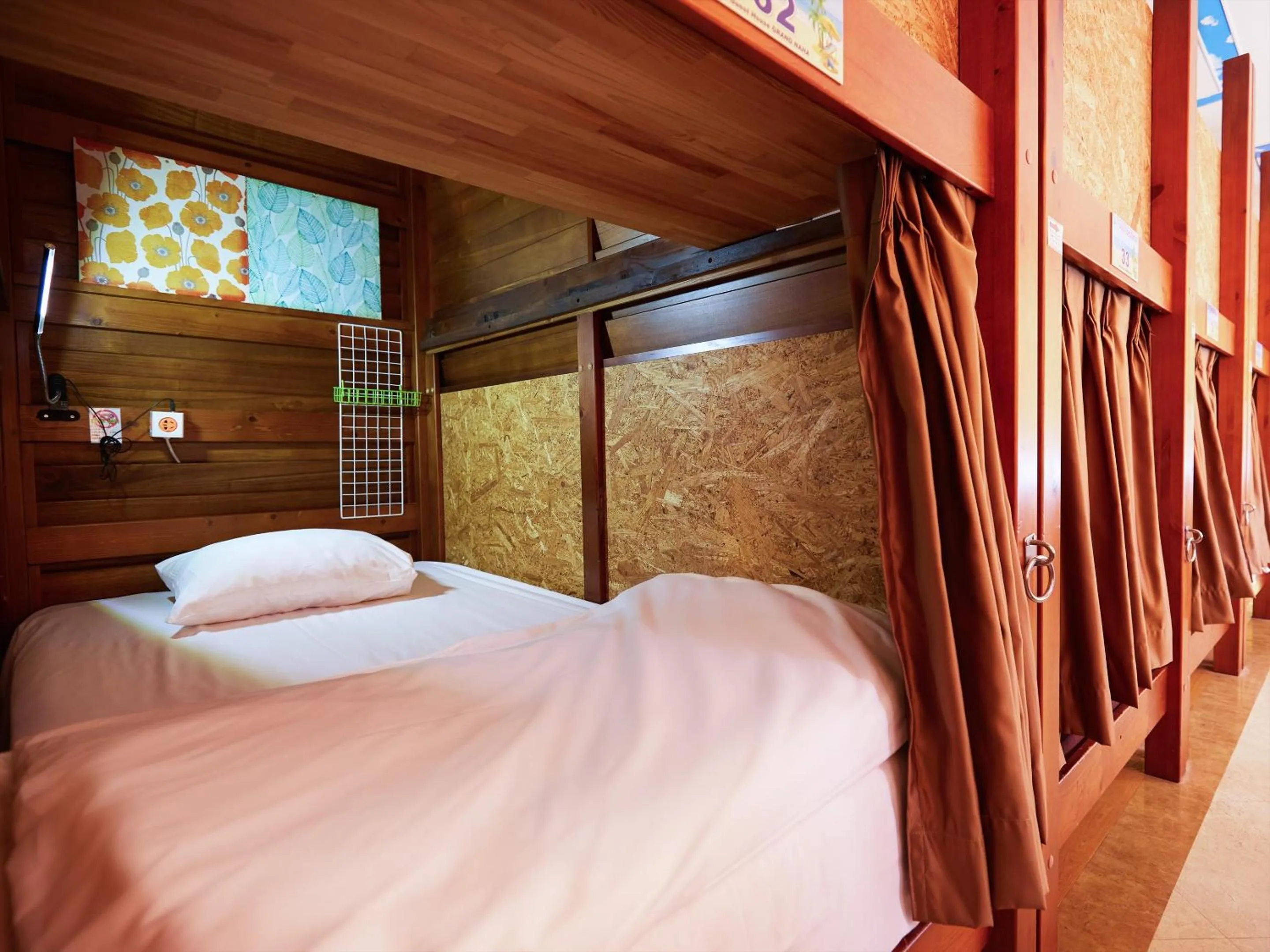 Bed in Guest House Grand Naha