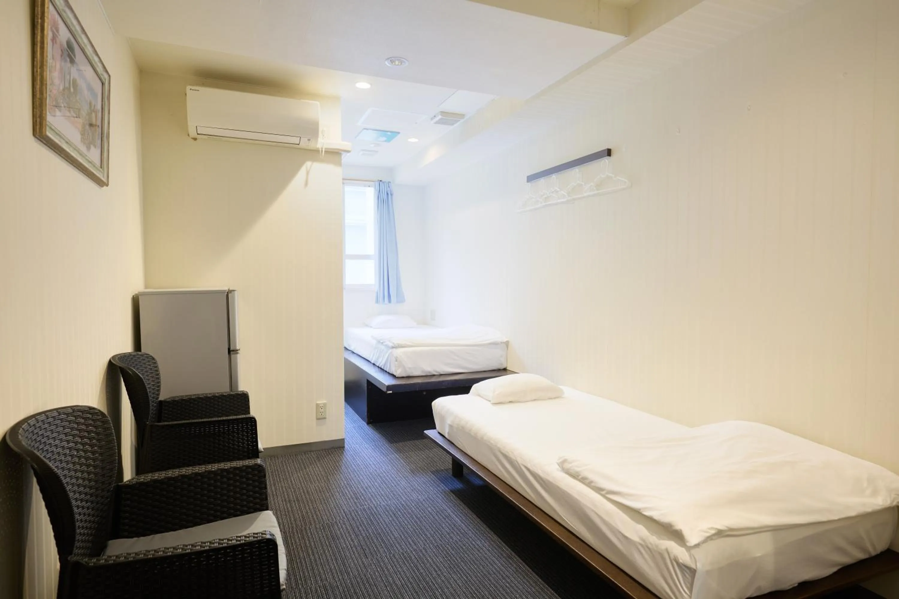 Photo of the whole room in Guest House Grand Naha