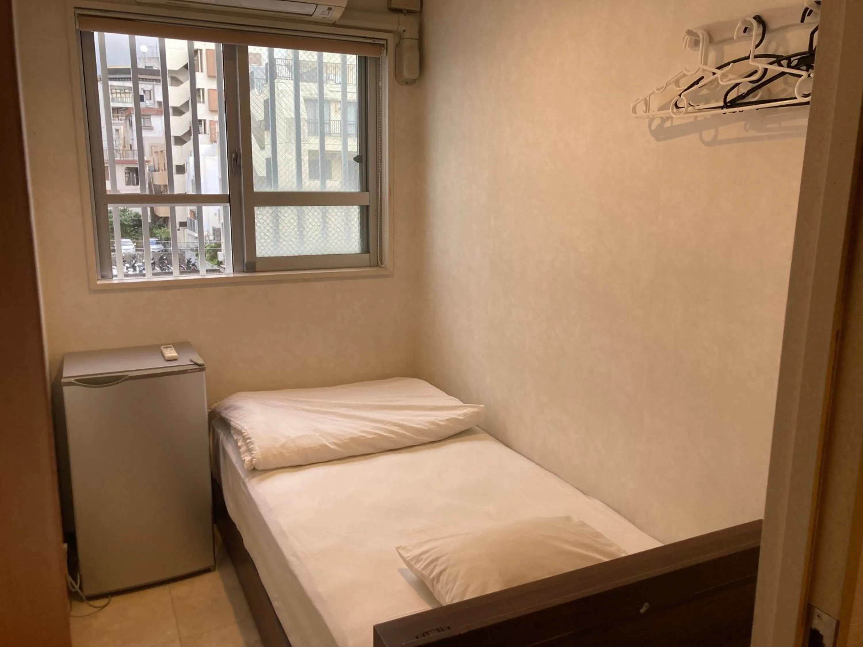 Photo of the whole room in Guest House Grand Naha