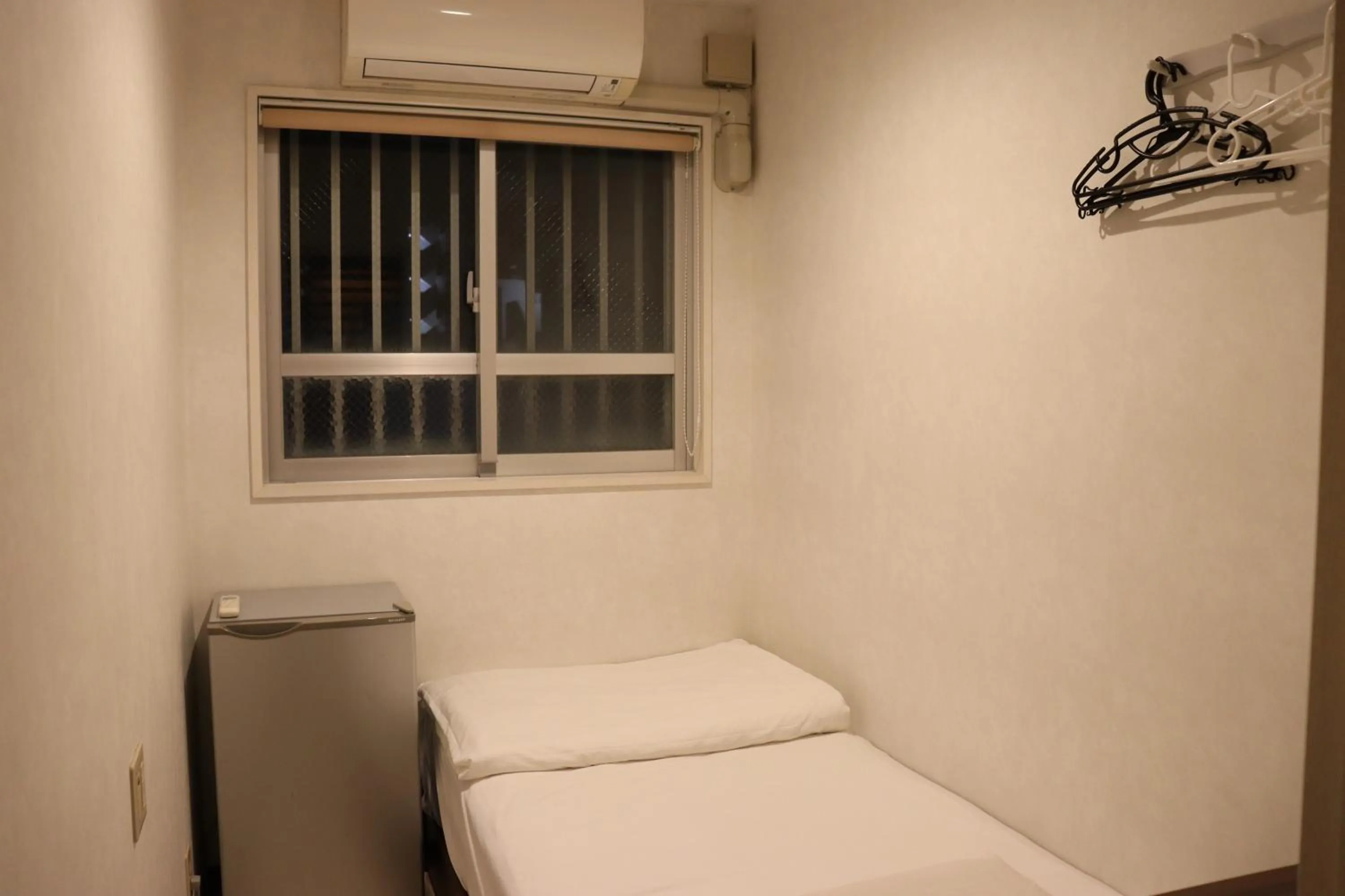 Photo of the whole room in Guest House Grand Naha