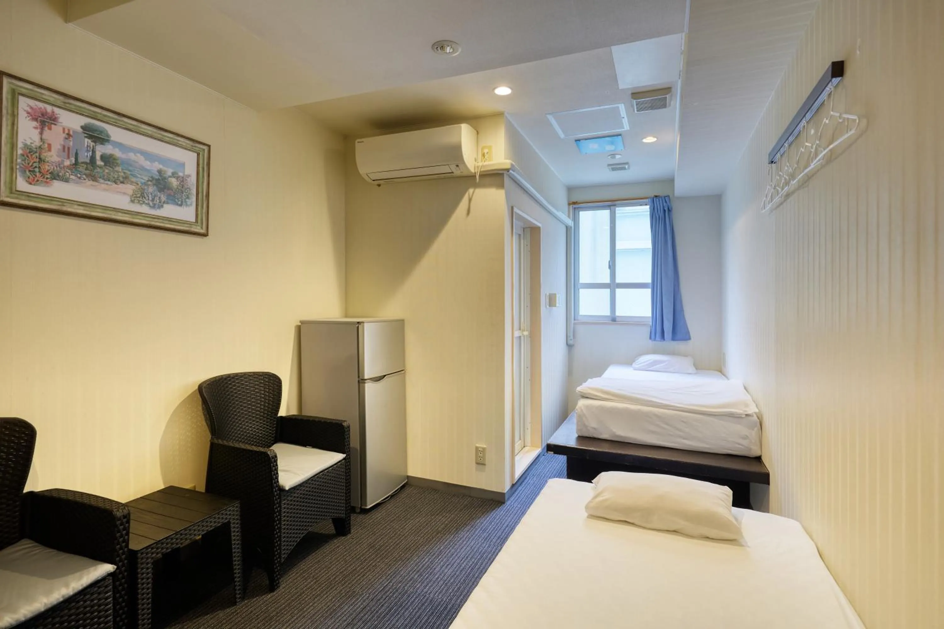 Photo of the whole room in Guest House Grand Naha