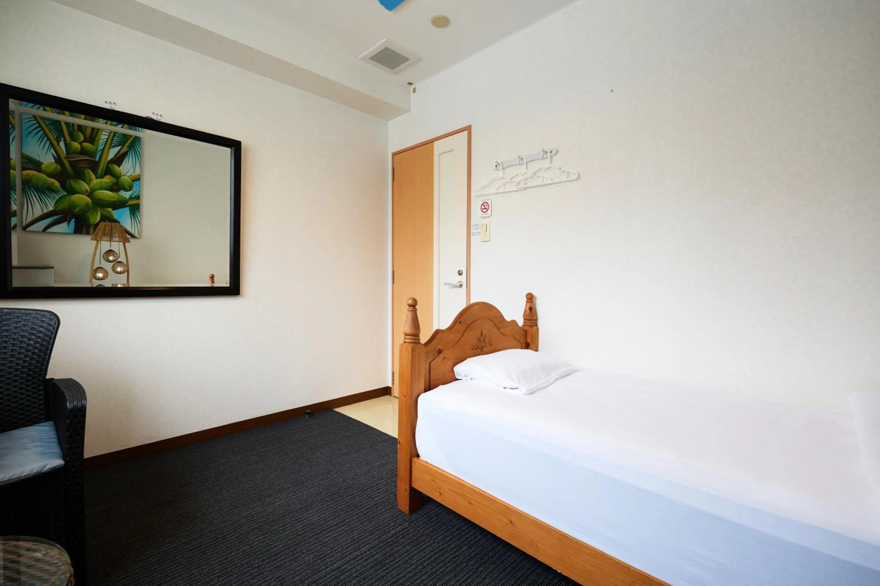 Photo of the whole room in Guest House Grand Naha