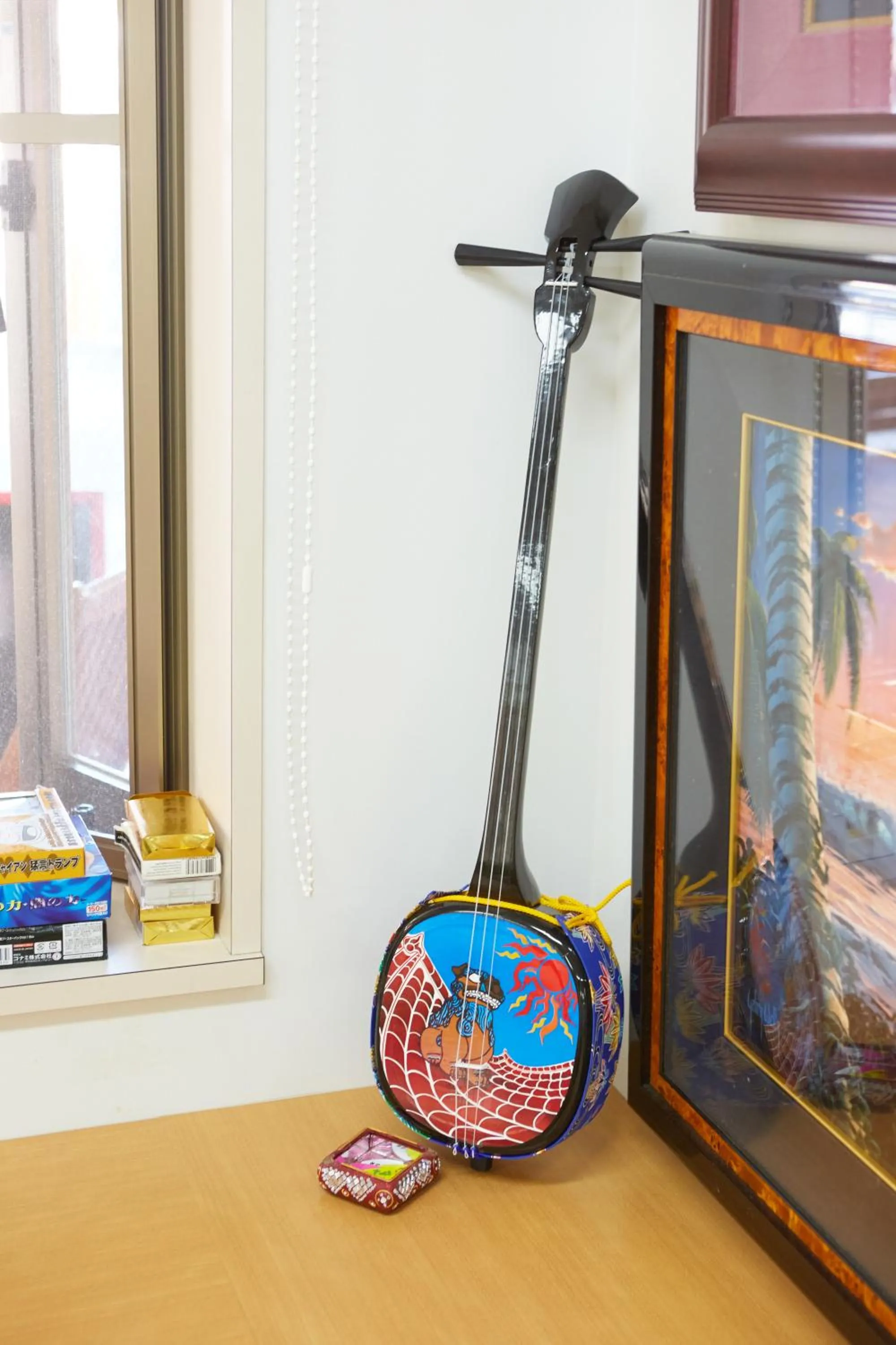 Communal lounge/ TV room in Guest House Grand Naha