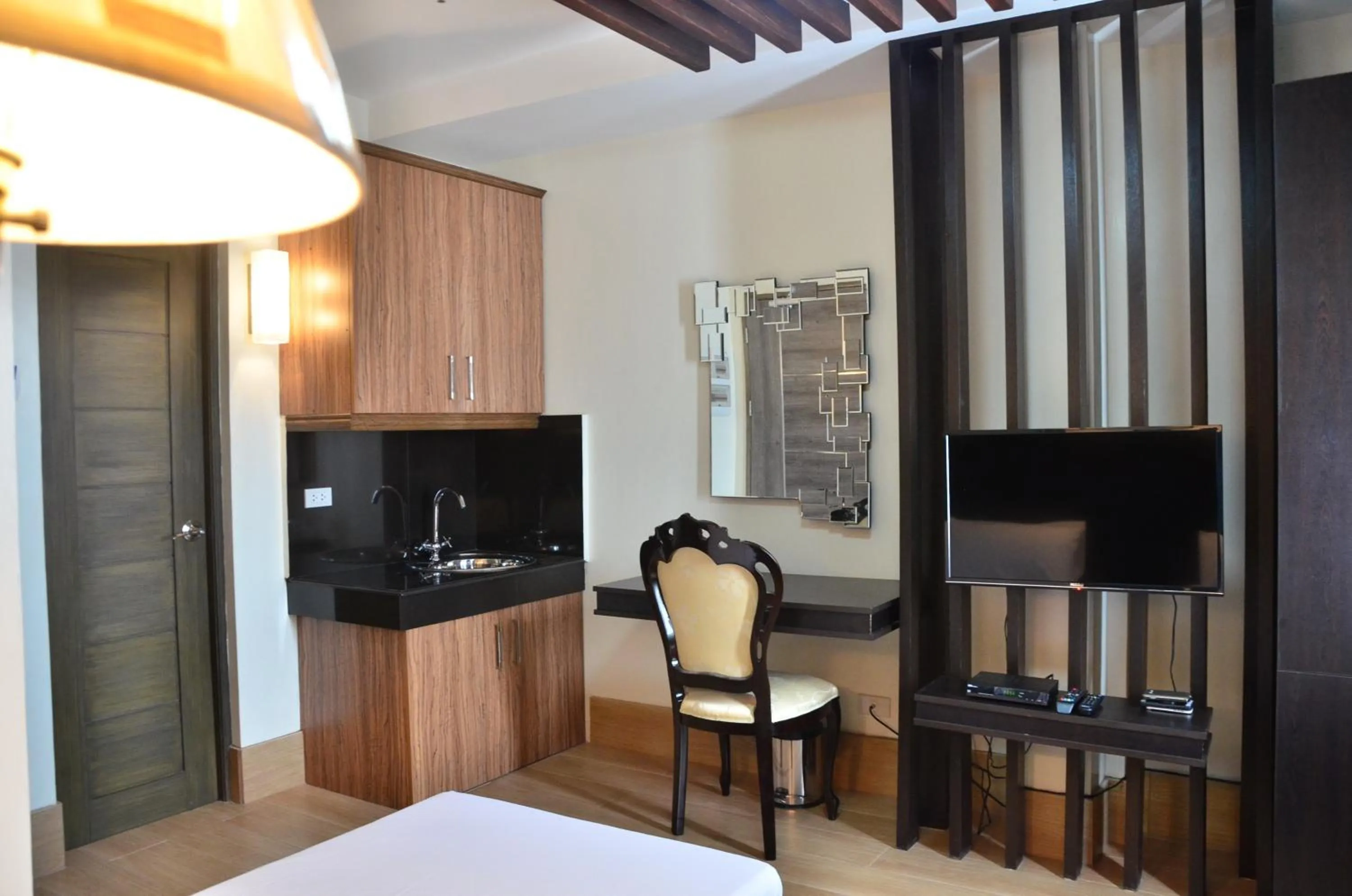 Photo of the whole room, Bed in Oriental Zen Suites