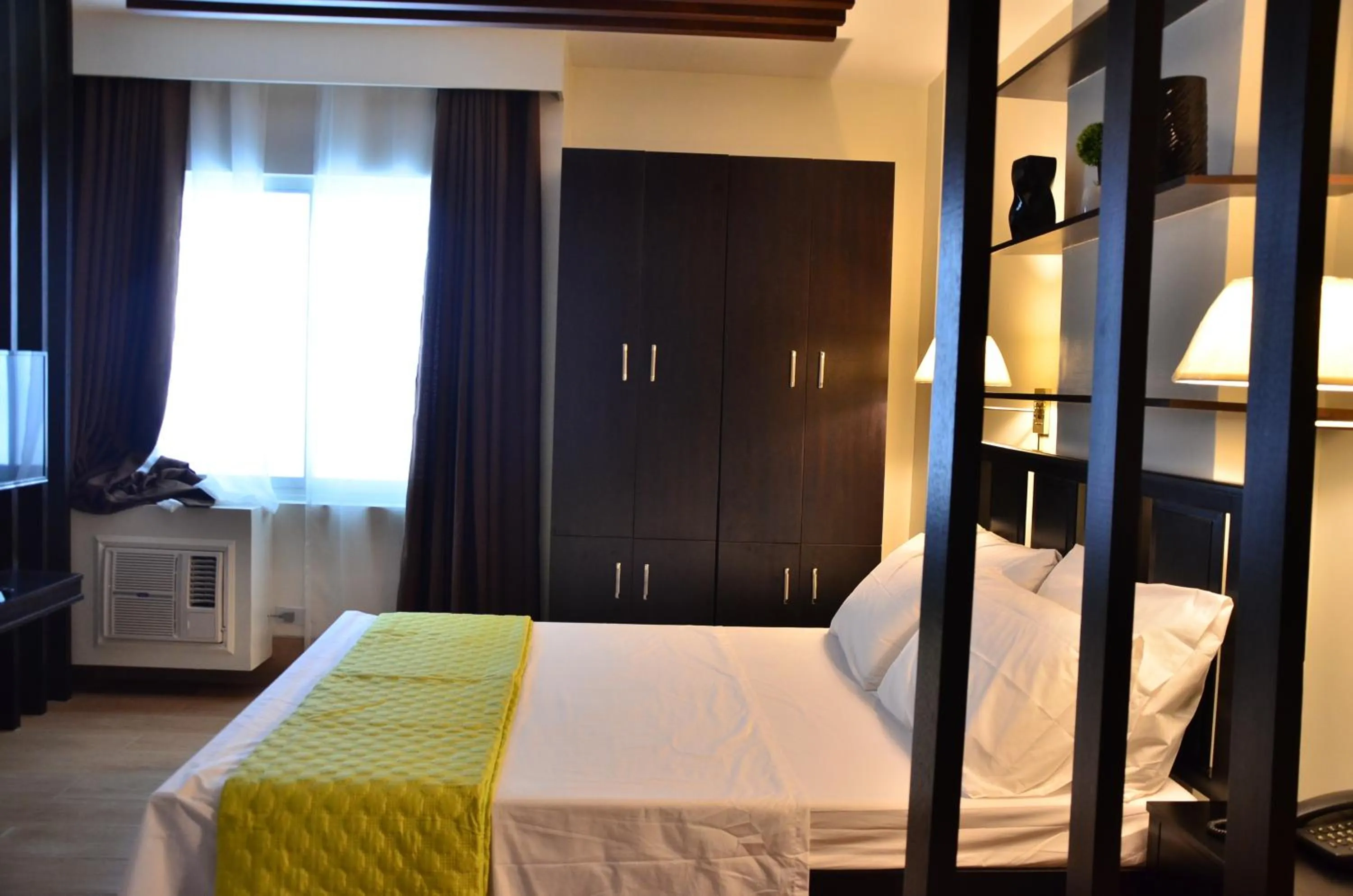 Bed in Oriental Zen Suites