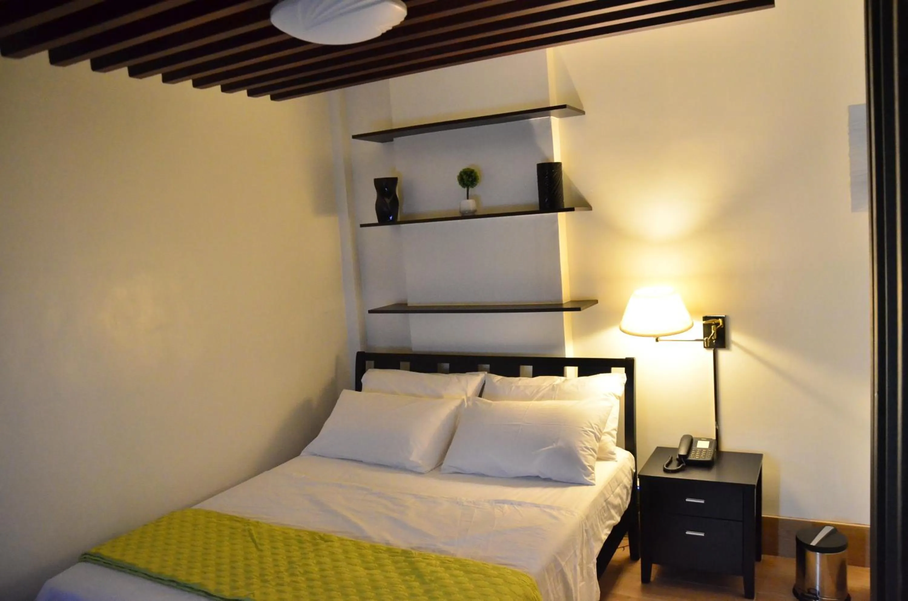 Bed in Oriental Zen Suites