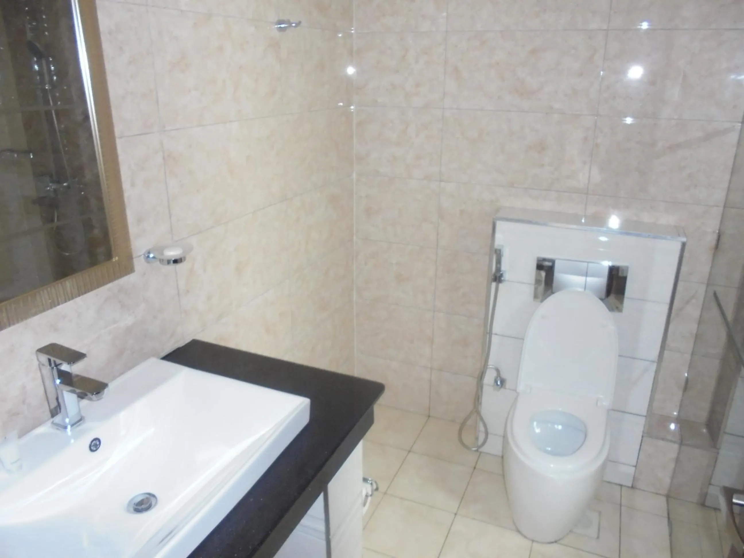 Bathroom in We Hotel and Suites