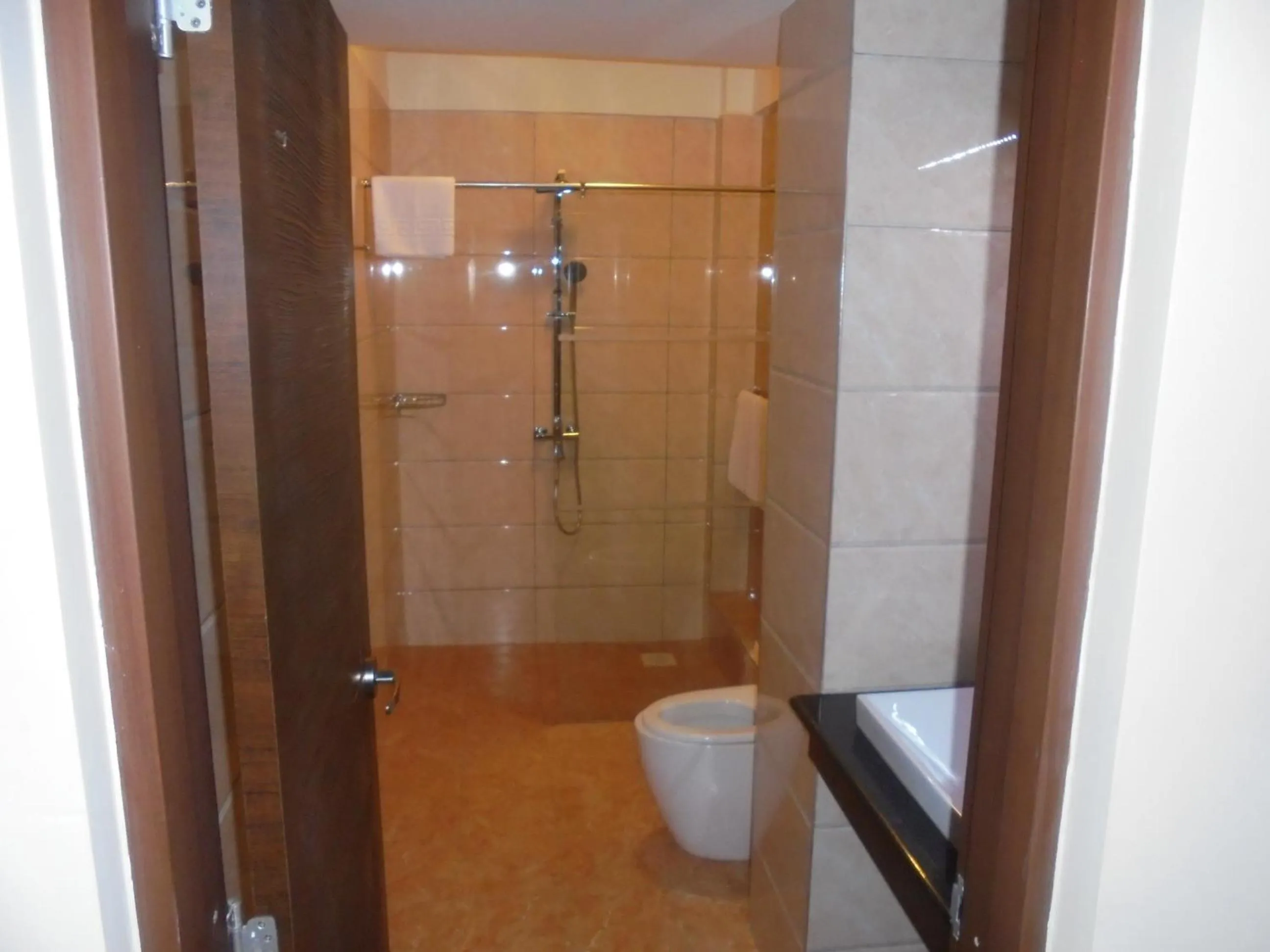 Bathroom in We Hotel and Suites