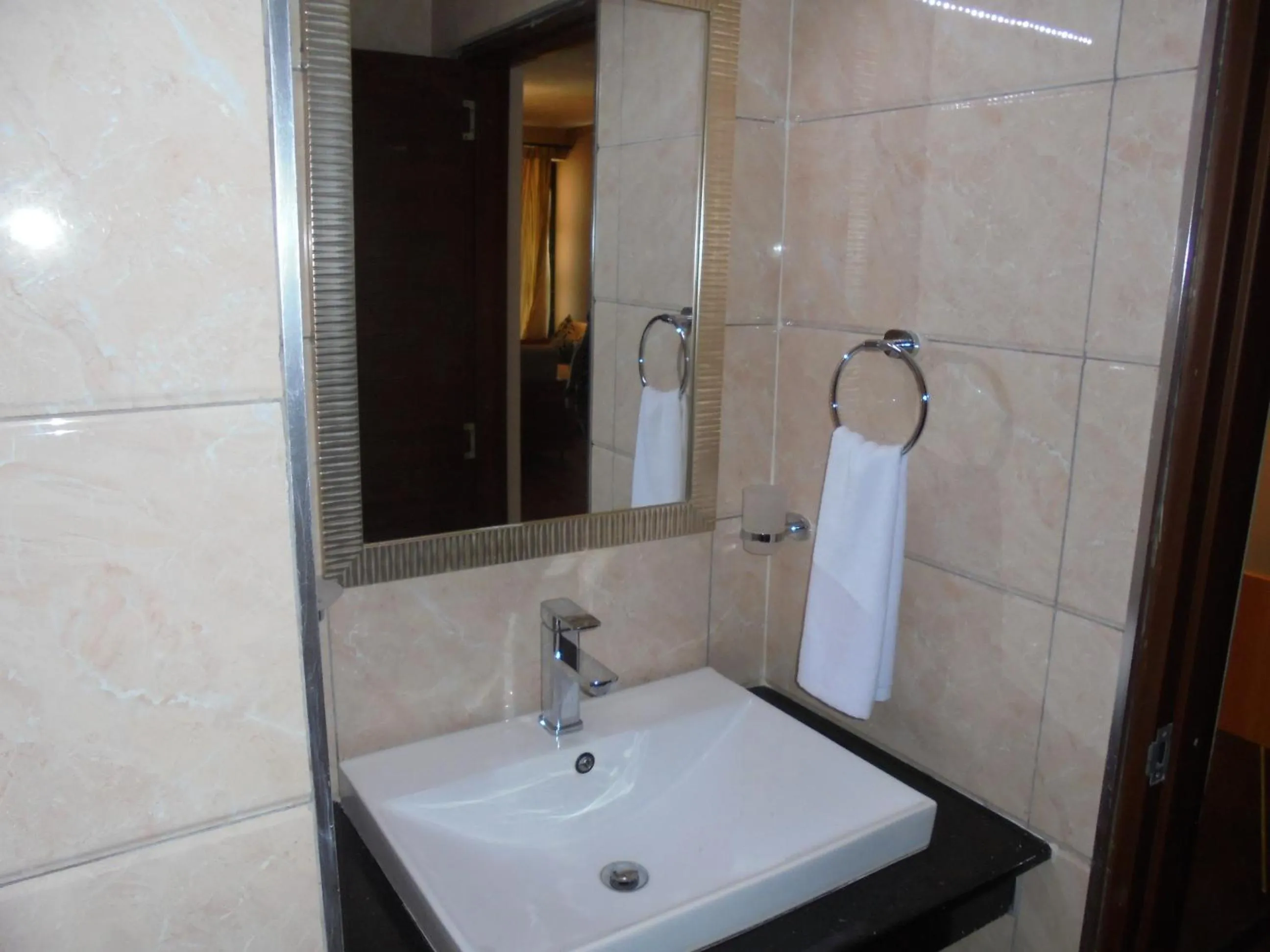 Bathroom in We Hotel and Suites