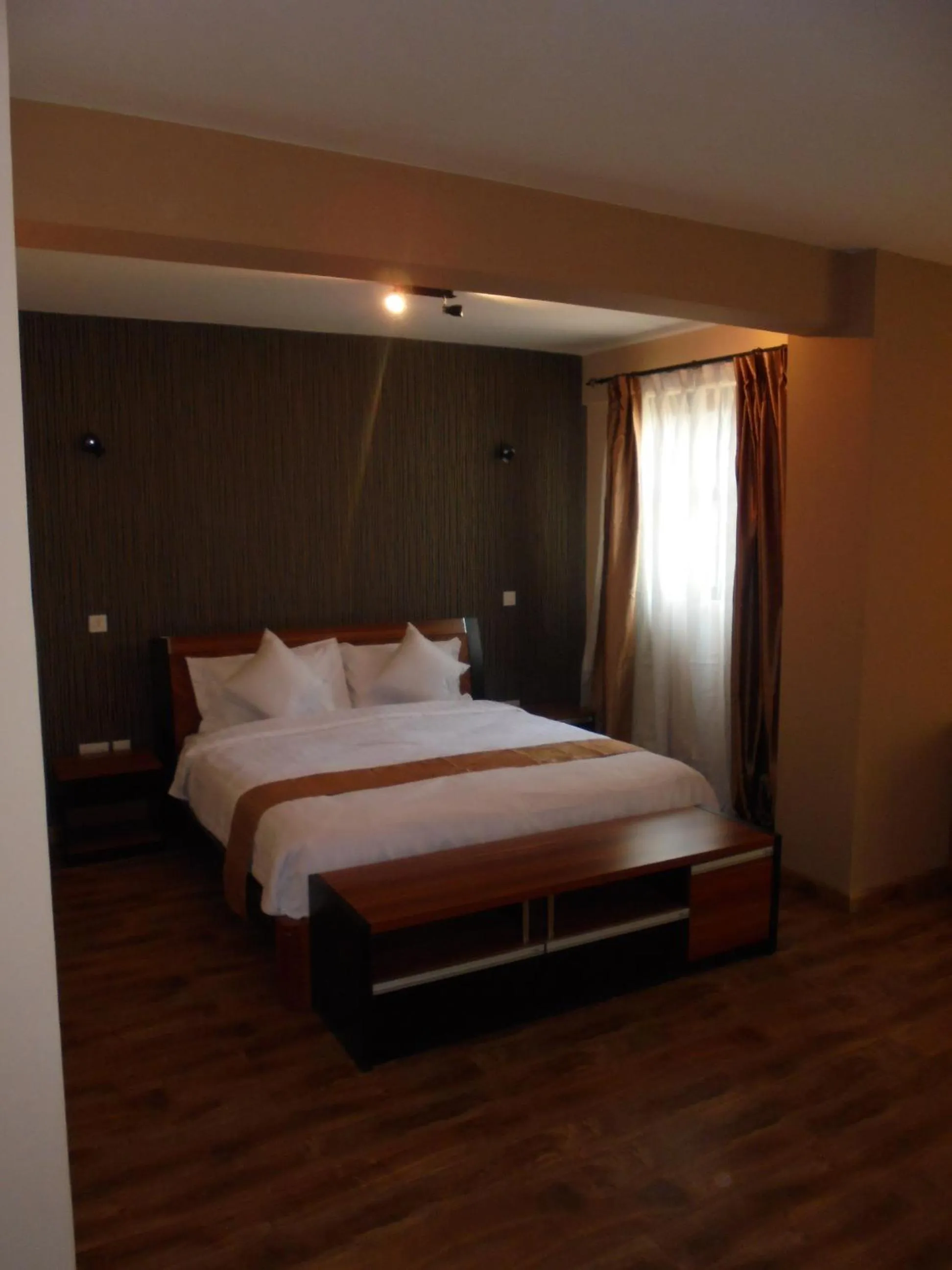 Photo of the whole room, Bed in We Hotel and Suites