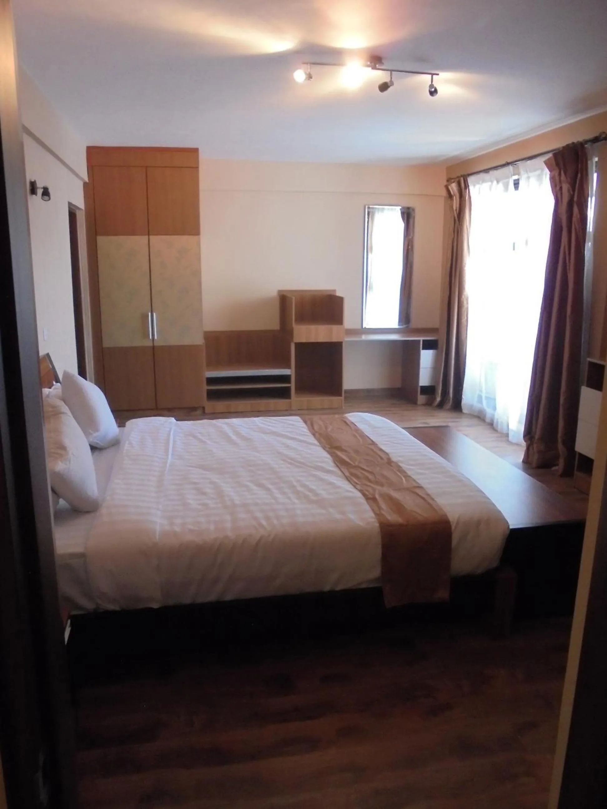 Photo of the whole room, Bed in We Hotel and Suites