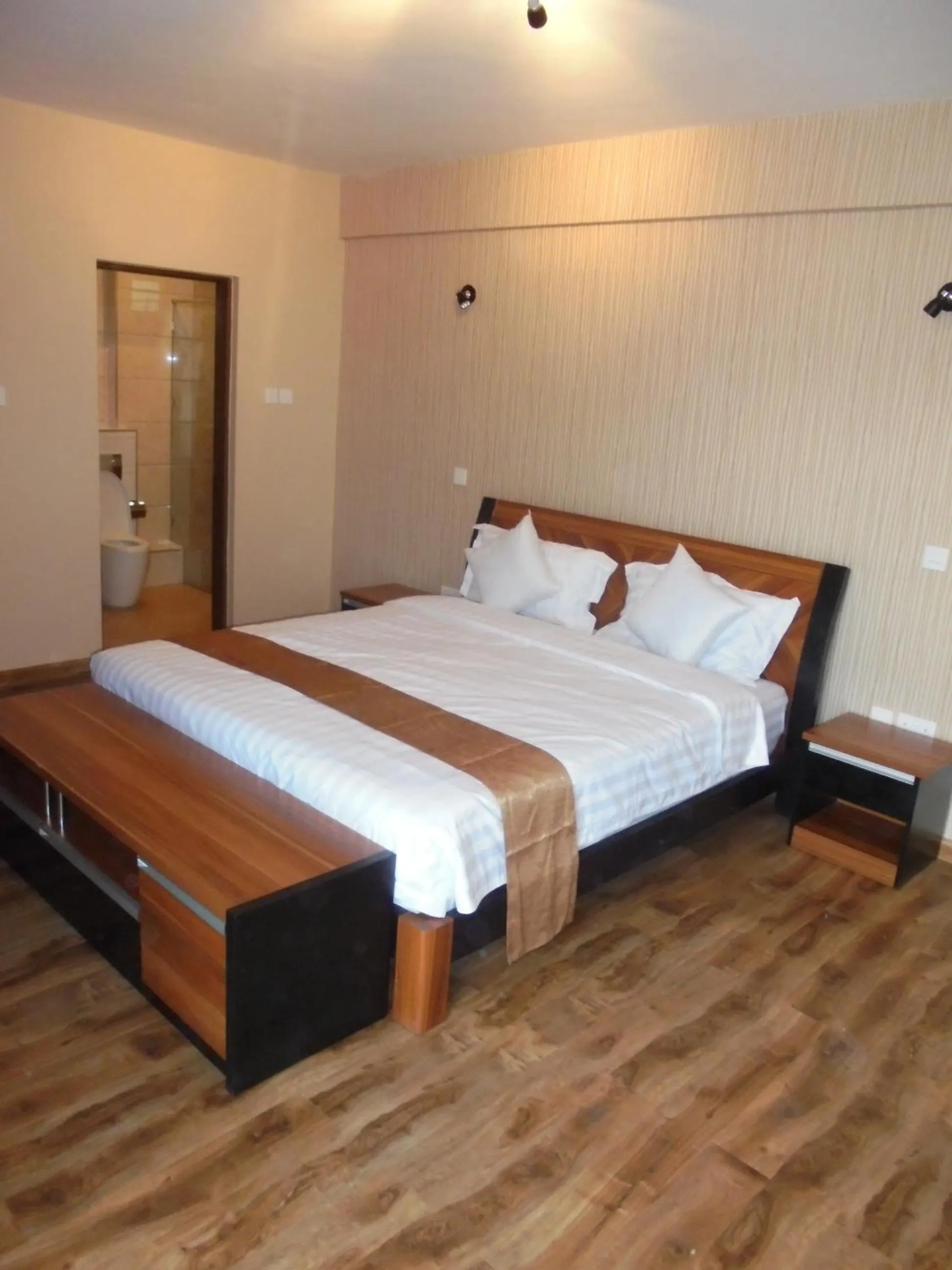Photo of the whole room, Bed in We Hotel and Suites