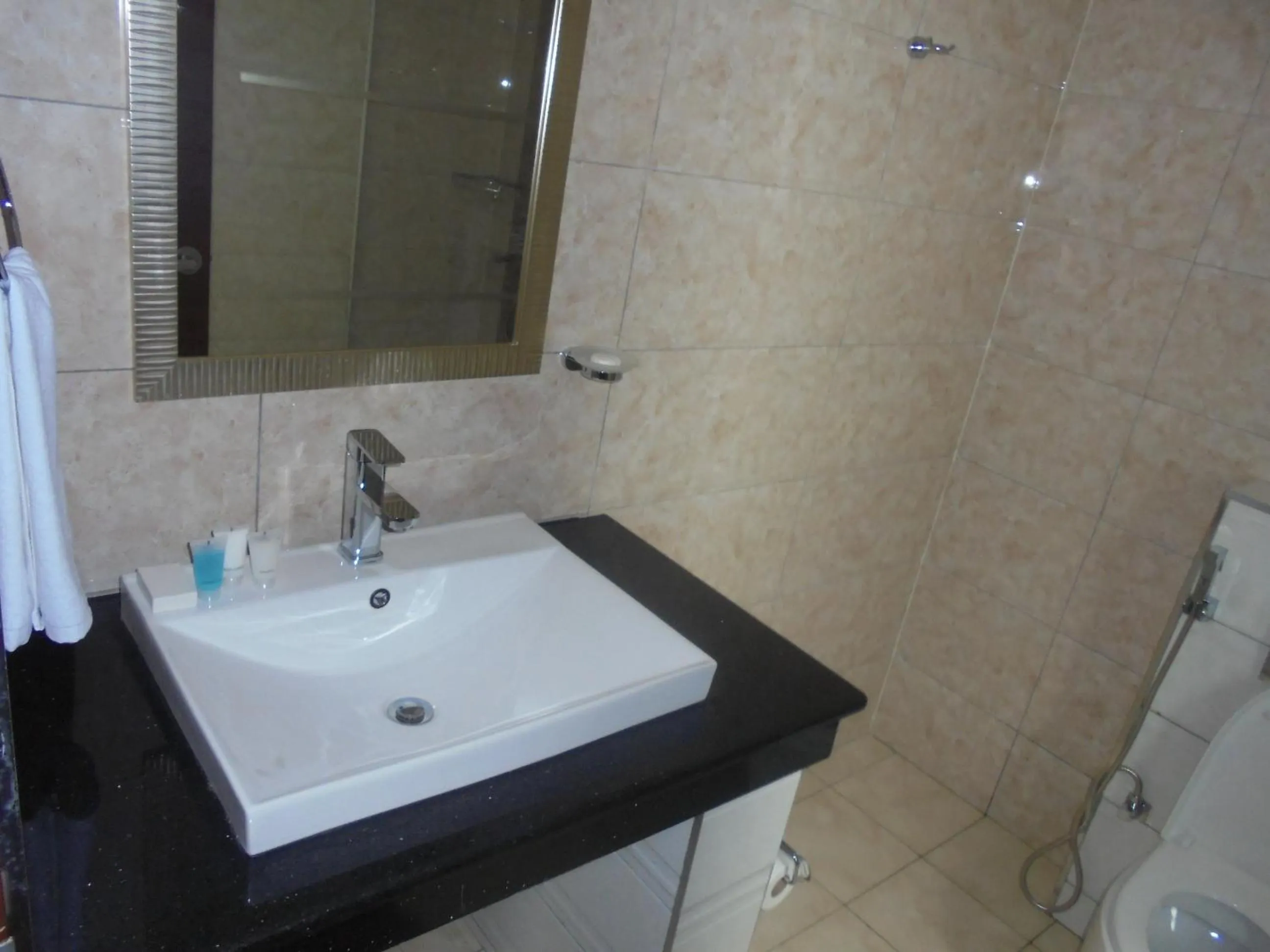 Bathroom in We Hotel and Suites