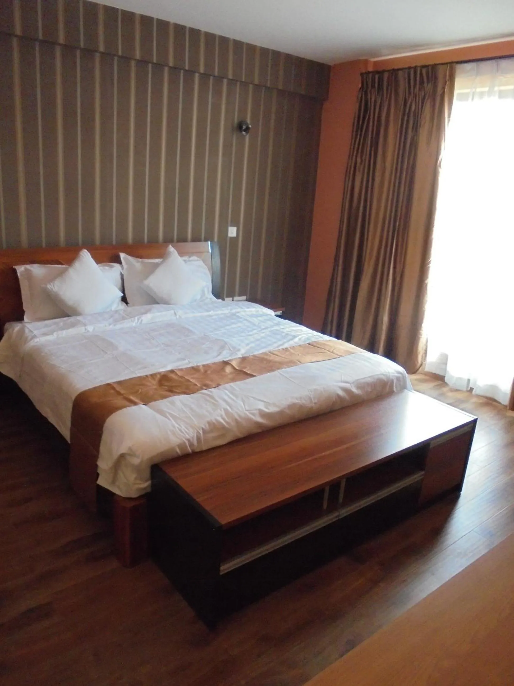 Photo of the whole room, Bed in We Hotel and Suites