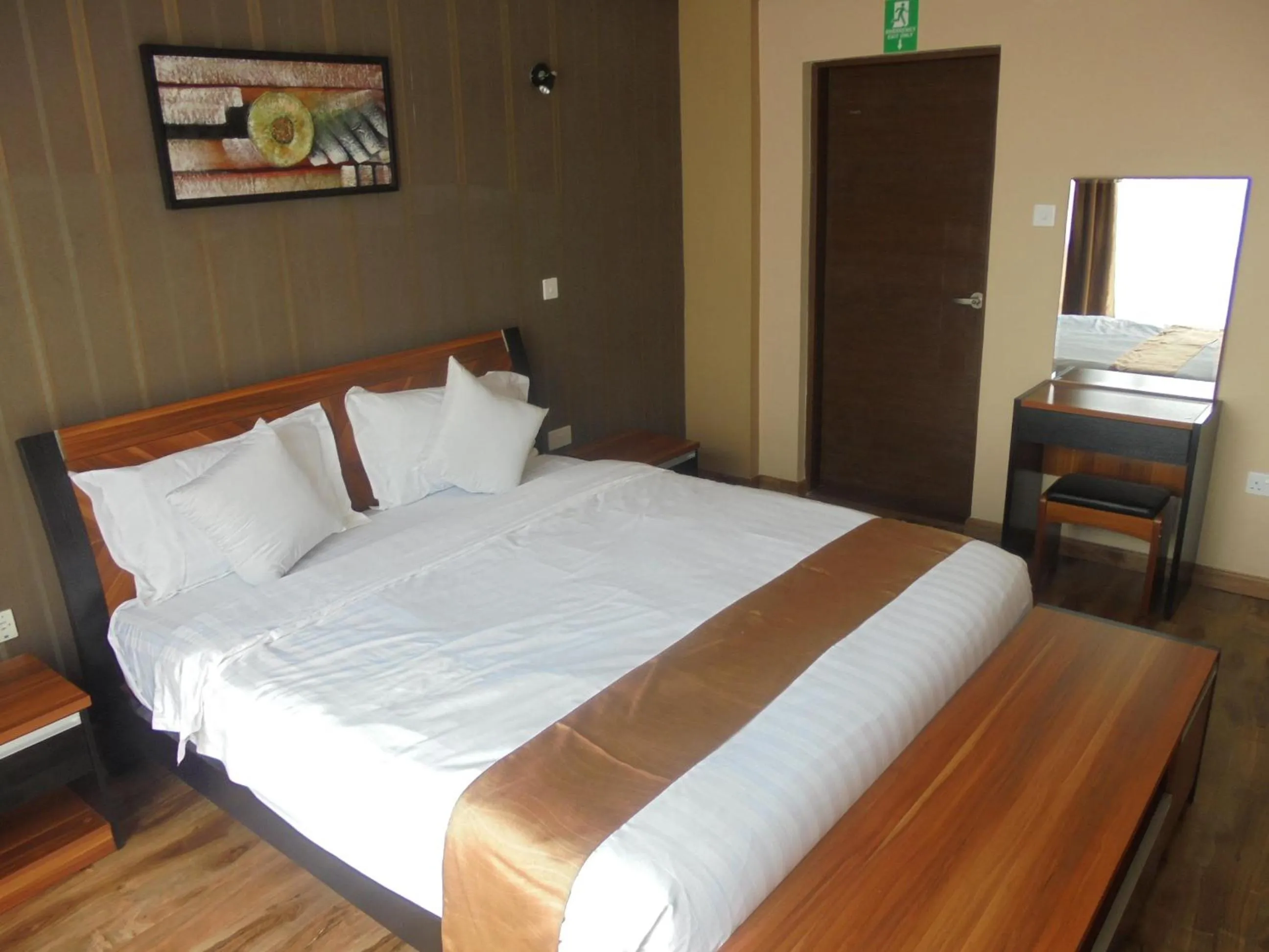 Photo of the whole room, Bed in We Hotel and Suites