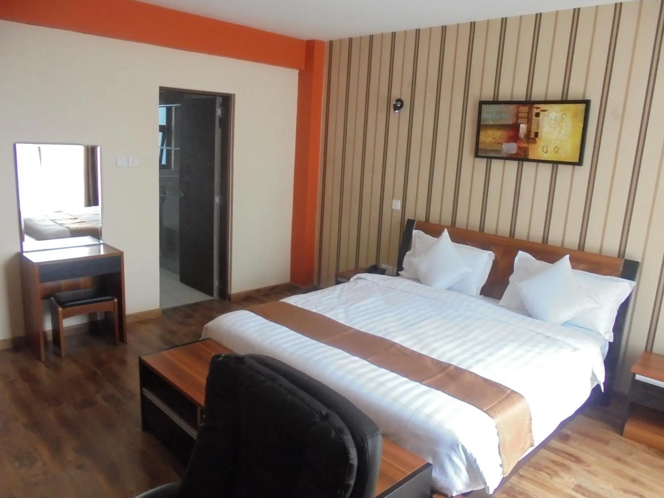 Photo of the whole room, Bed in We Hotel and Suites