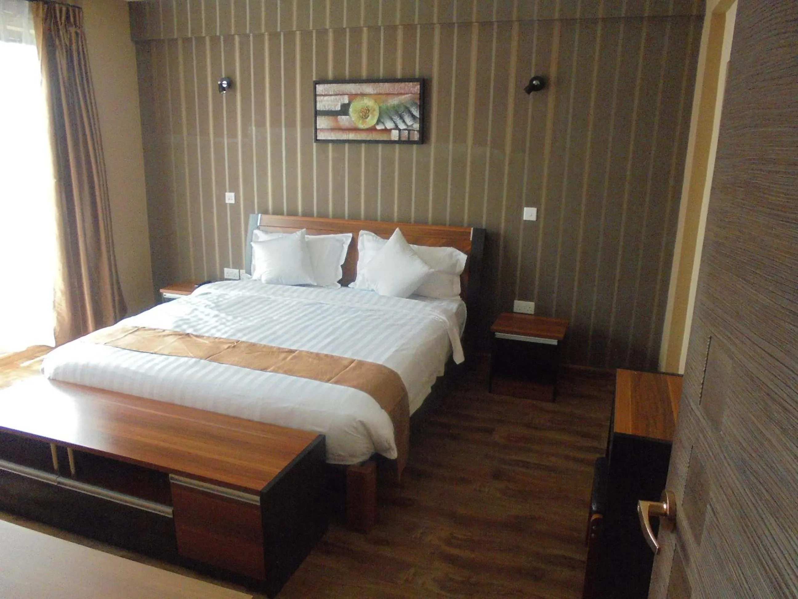 Bedroom, Bed in We Hotel and Suites