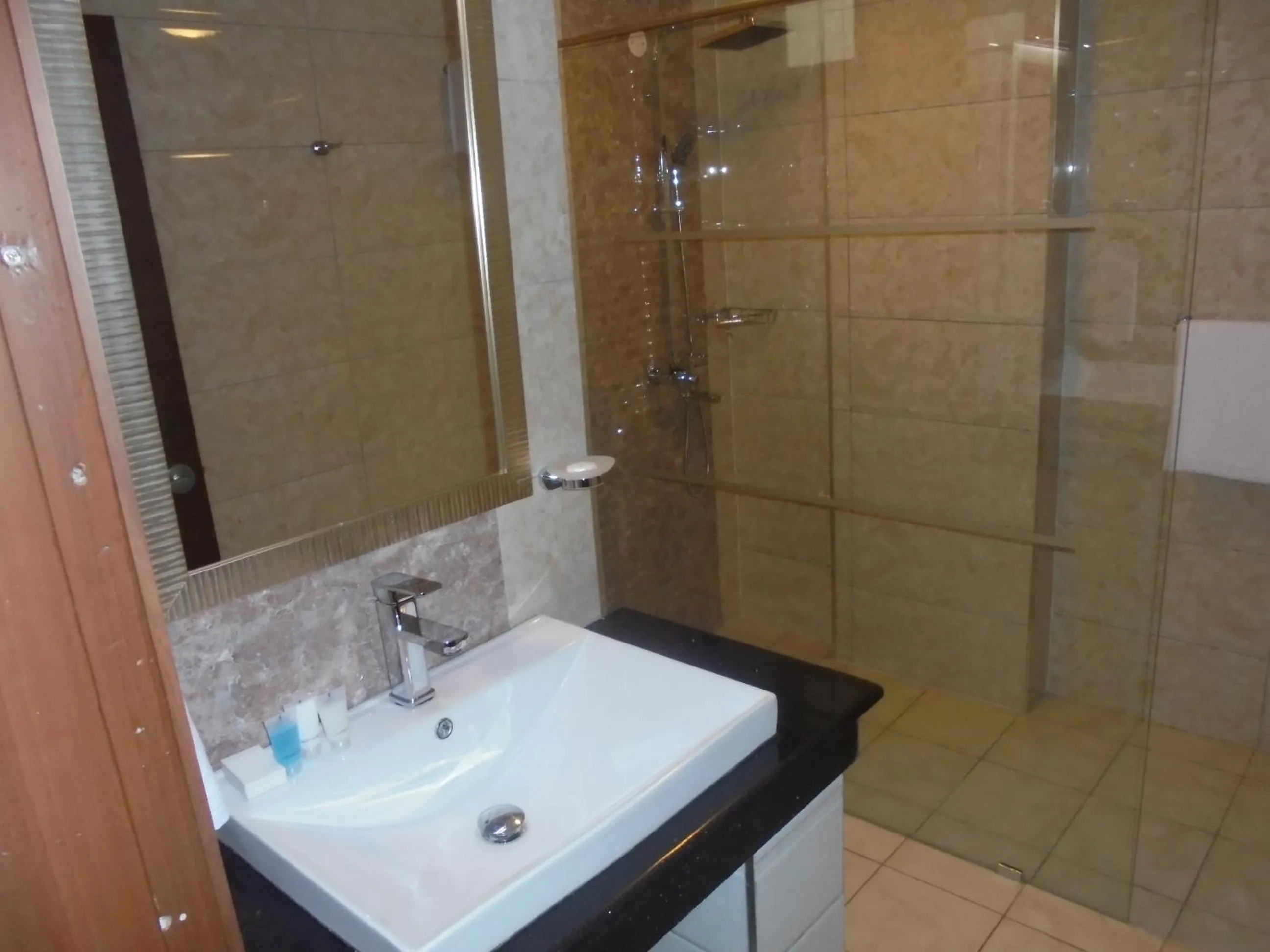 Bathroom in We Hotel and Suites