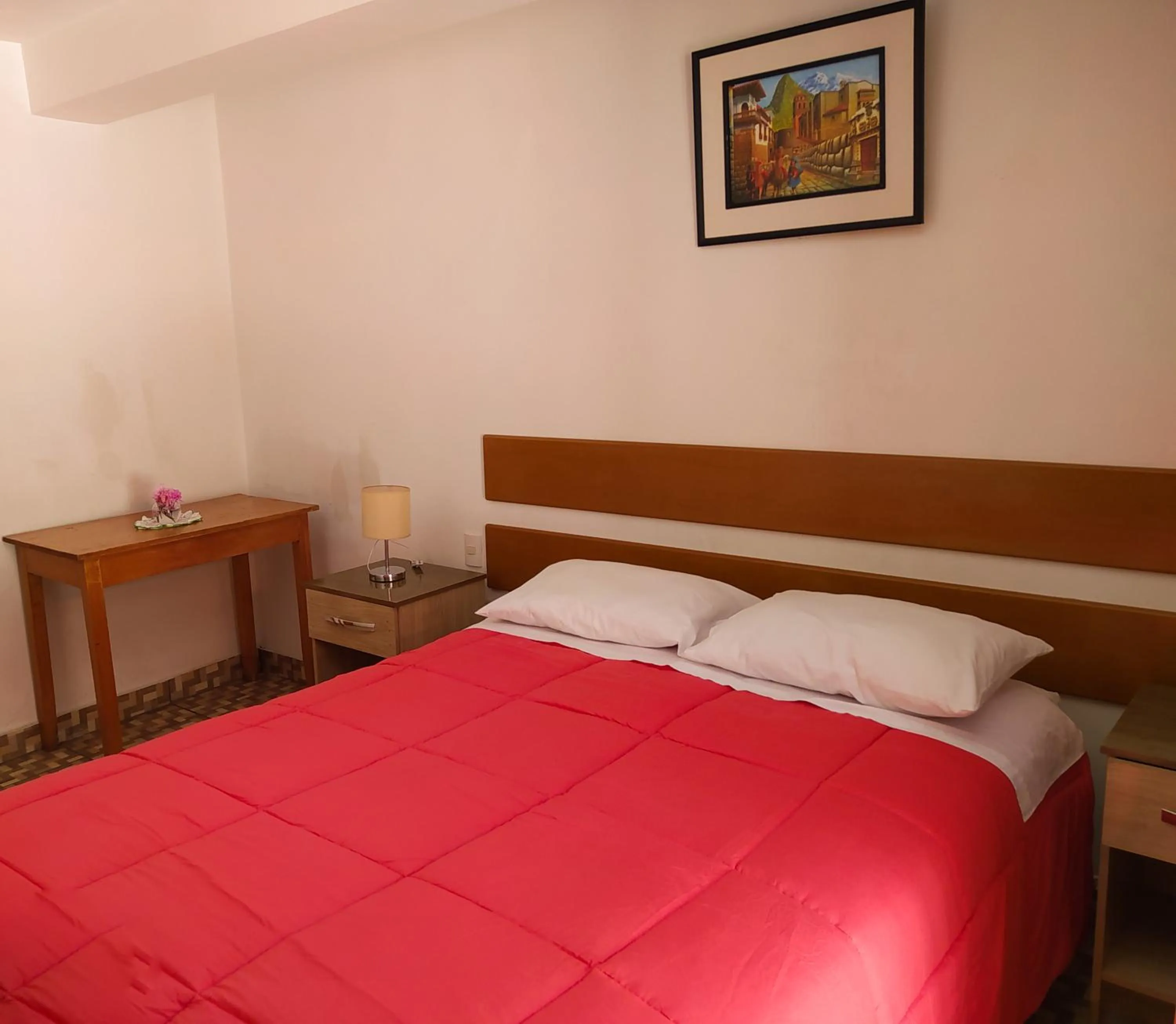 Bed in Tambo de Ollantay Hotel