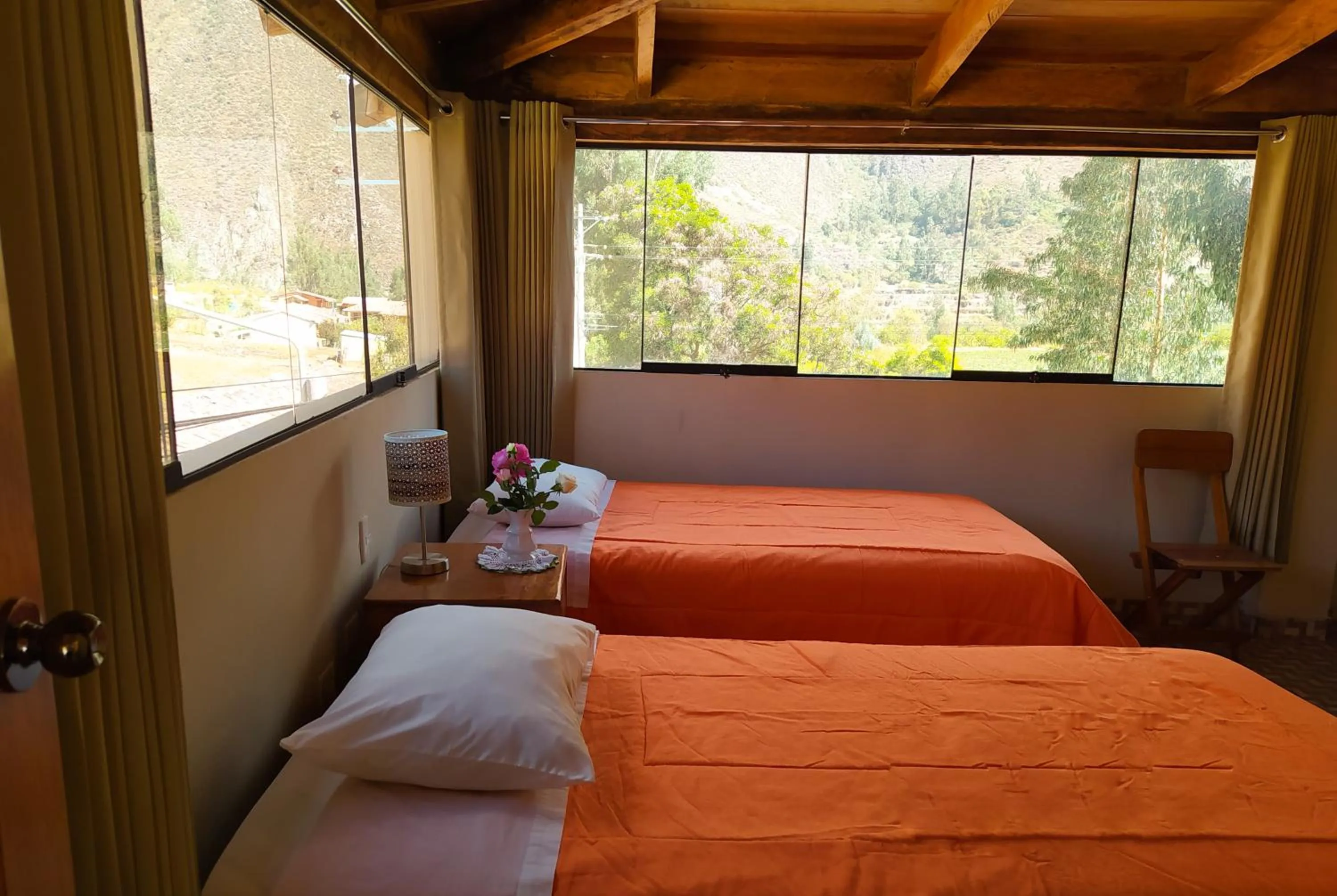 Bed in Tambo de Ollantay Hotel