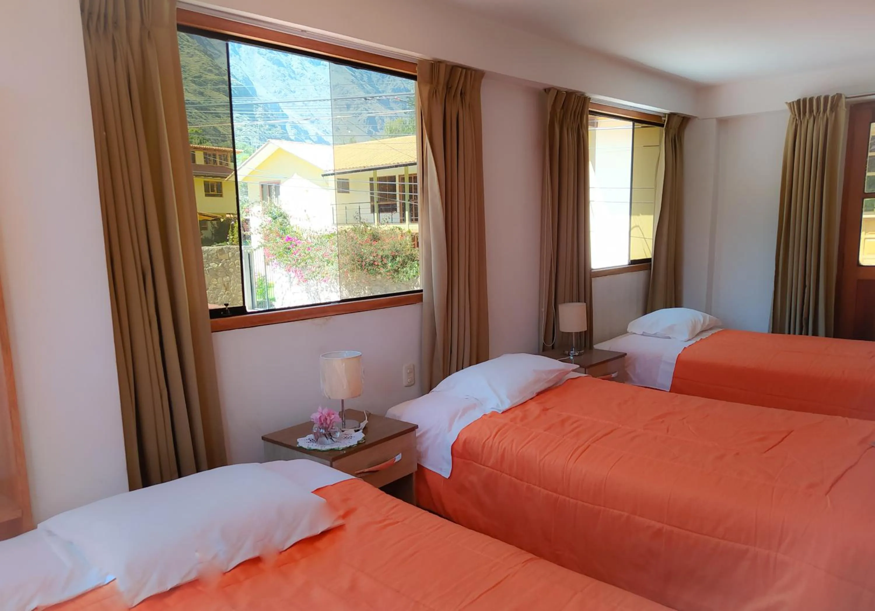 Bed in Tambo de Ollantay Hotel