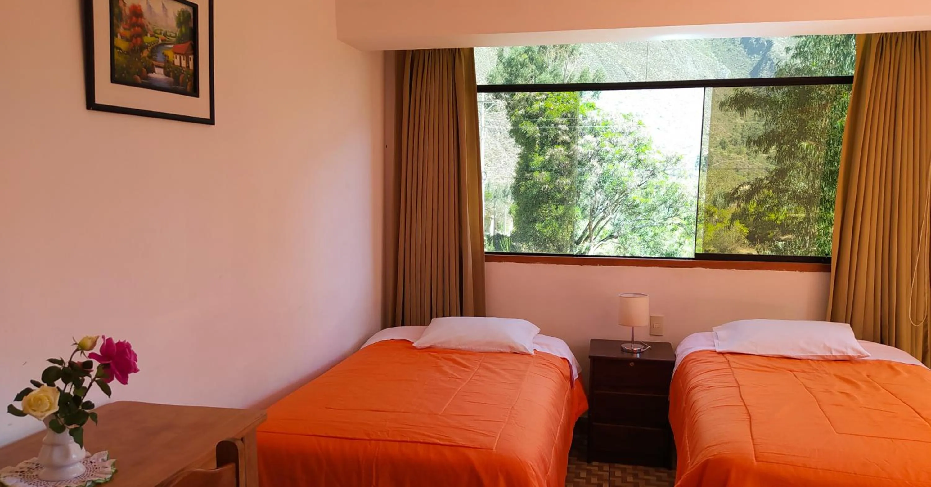 Bed in Tambo de Ollantay Hotel