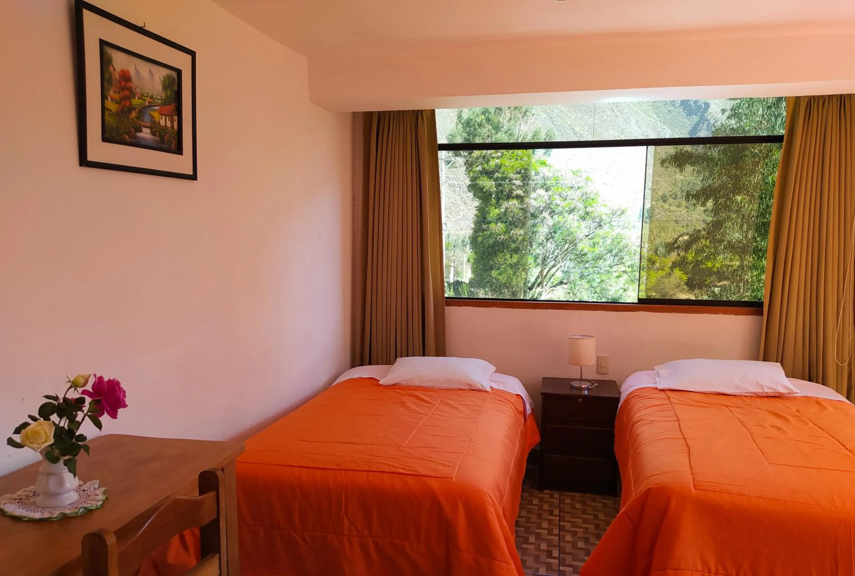 Bed in Tambo de Ollantay Hotel