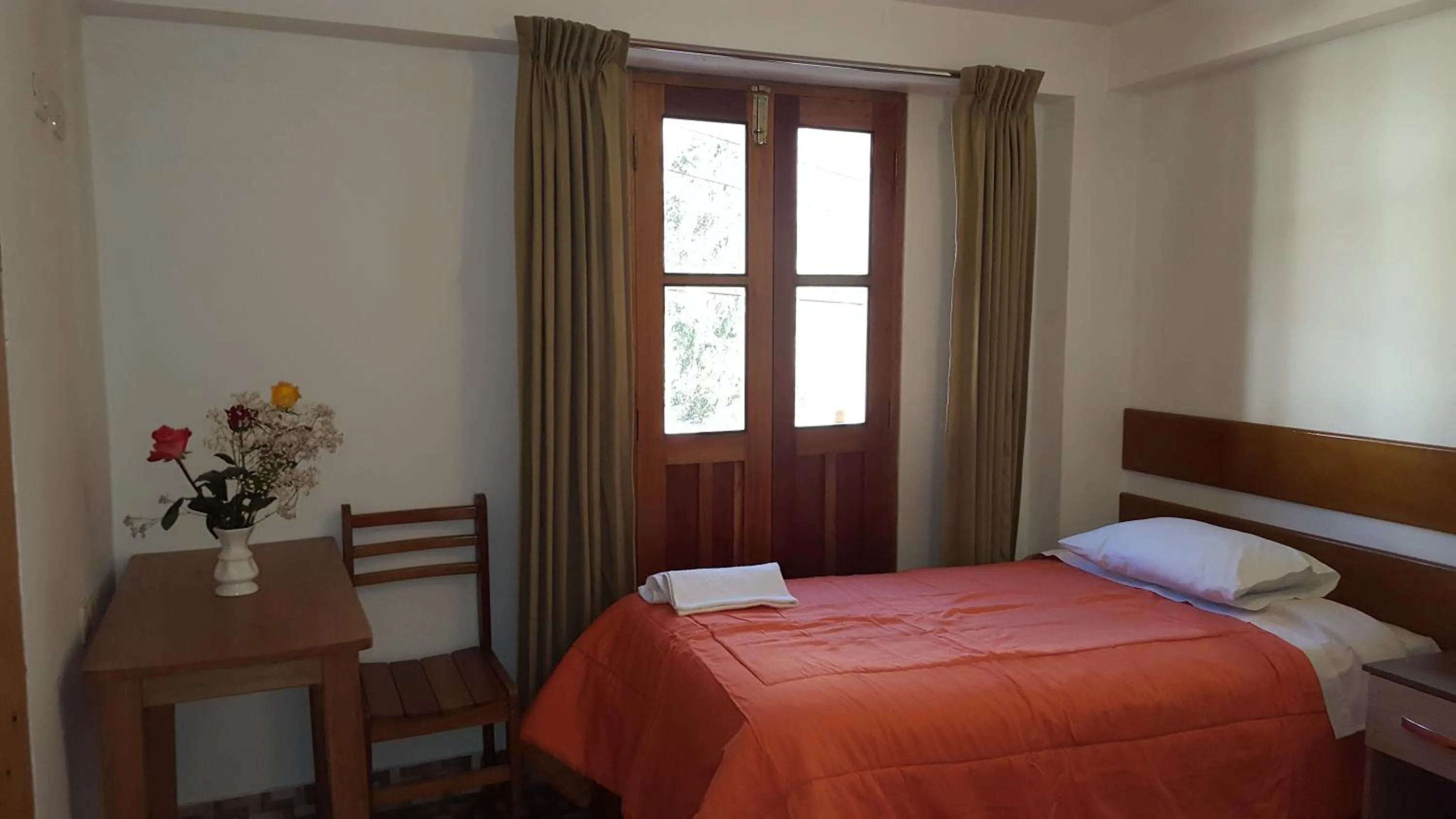 Photo of the whole room, Bed in Tambo de Ollantay Hotel