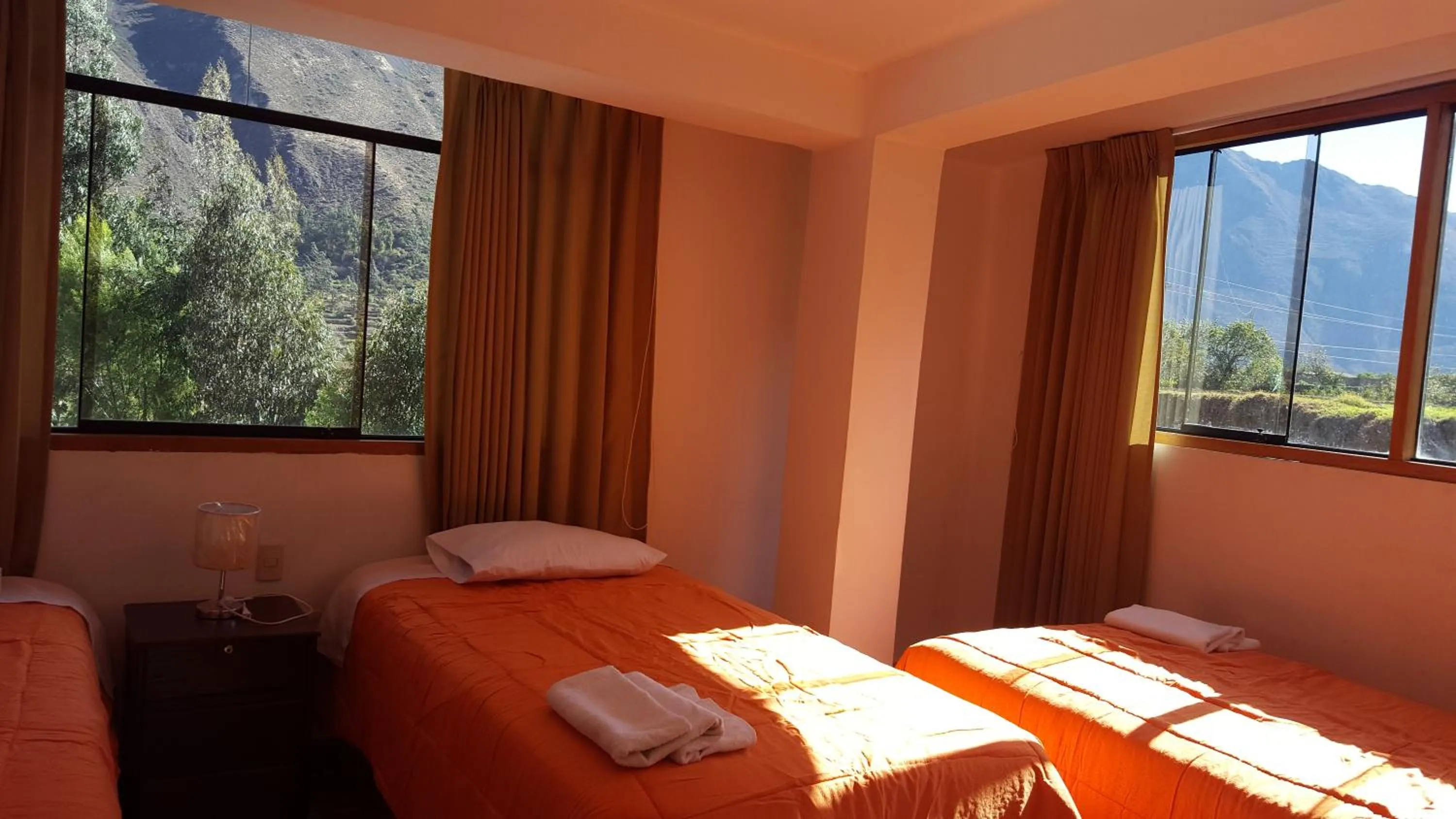 Bed in Tambo de Ollantay Hotel